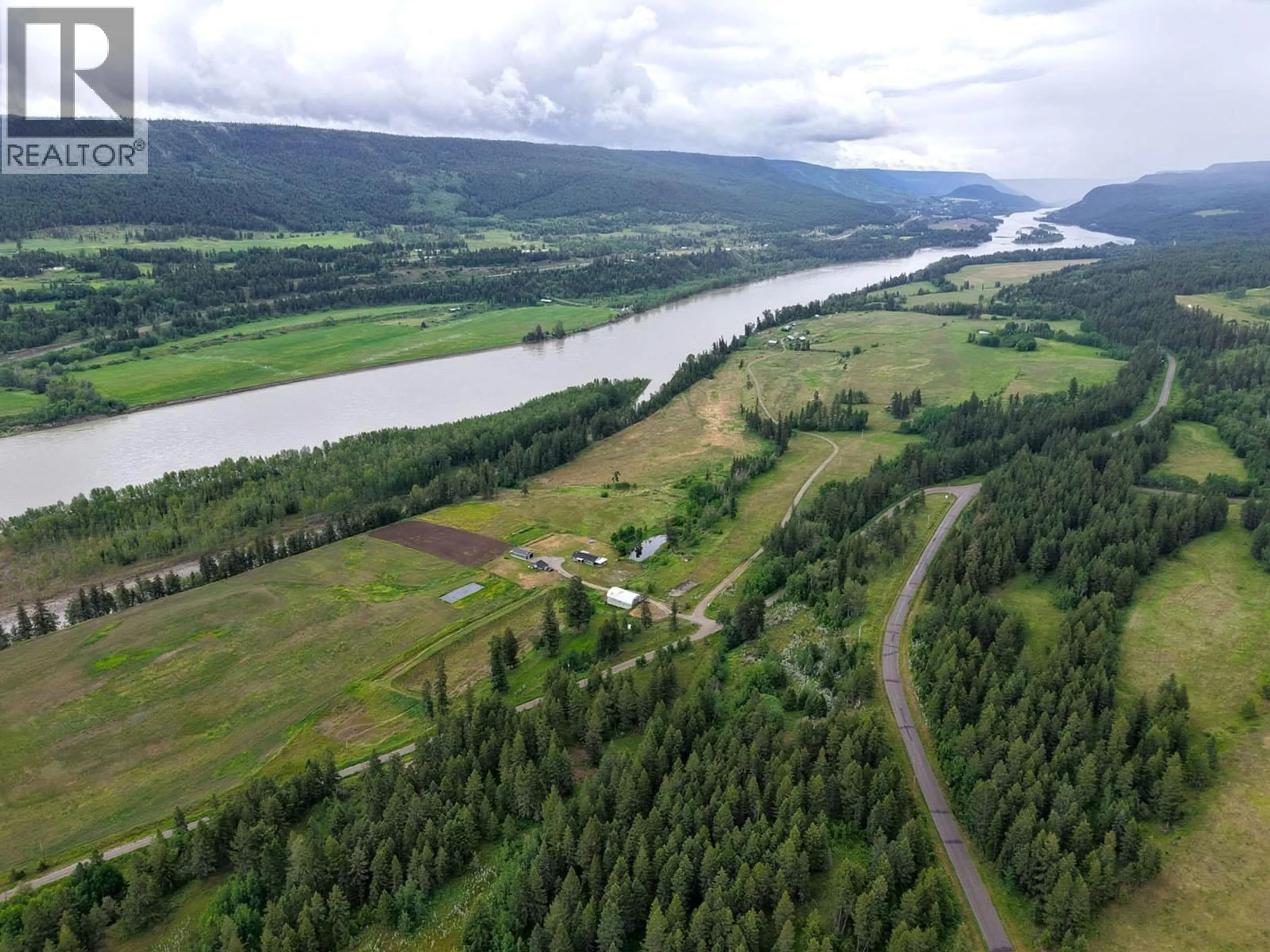 A pic from outside/outdoor area/front of a property/back of a property/a pic from drone, water/lake/river/ocean view for 9811 MARGUERITE FERRY ROAD, Quesnel British Columbia V2J6R6