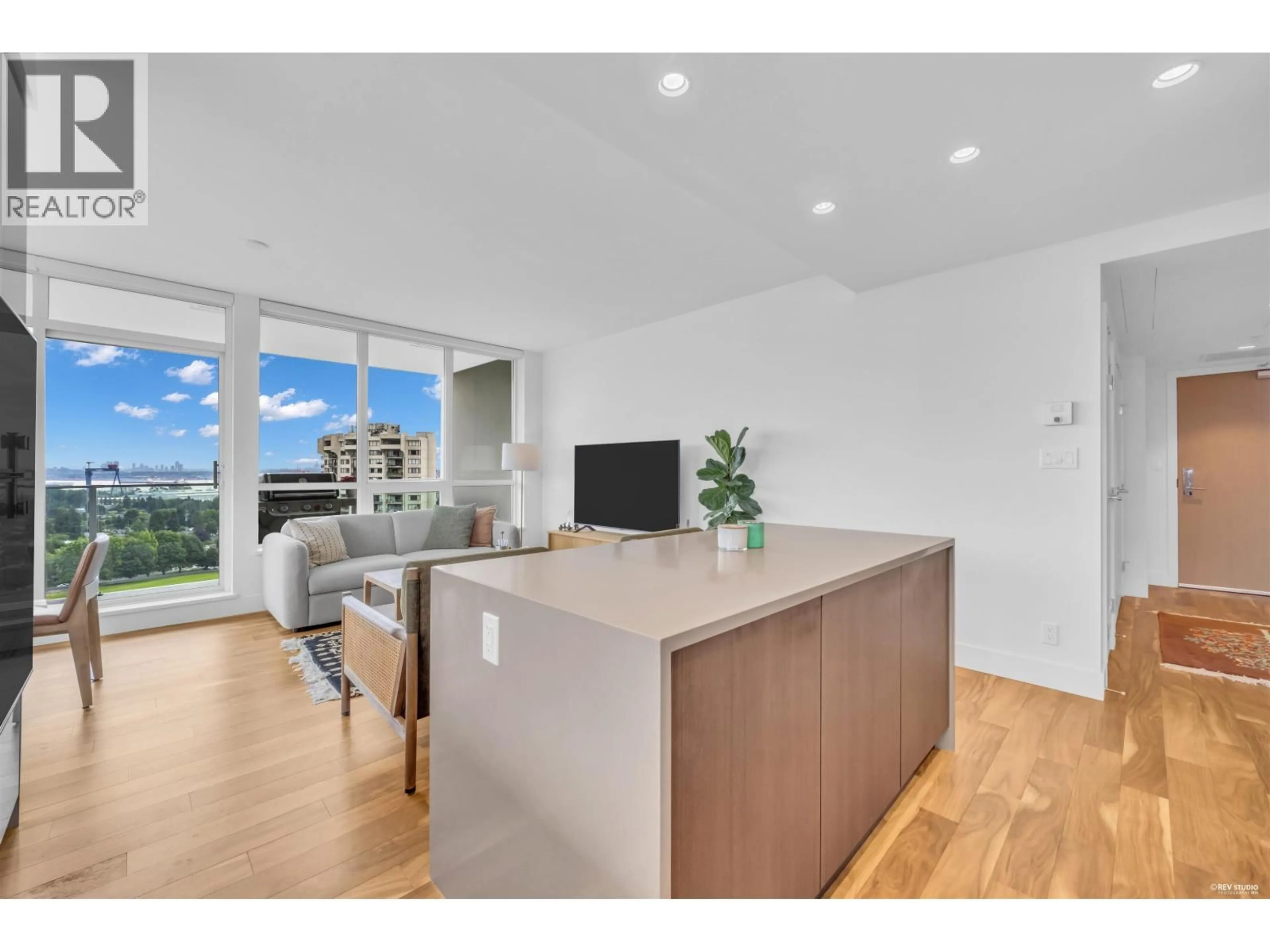 Open concept kitchen, wood/laminate floor for 2001 - 1632 LIONS GATE LANE, North Vancouver British Columbia V7P0E2