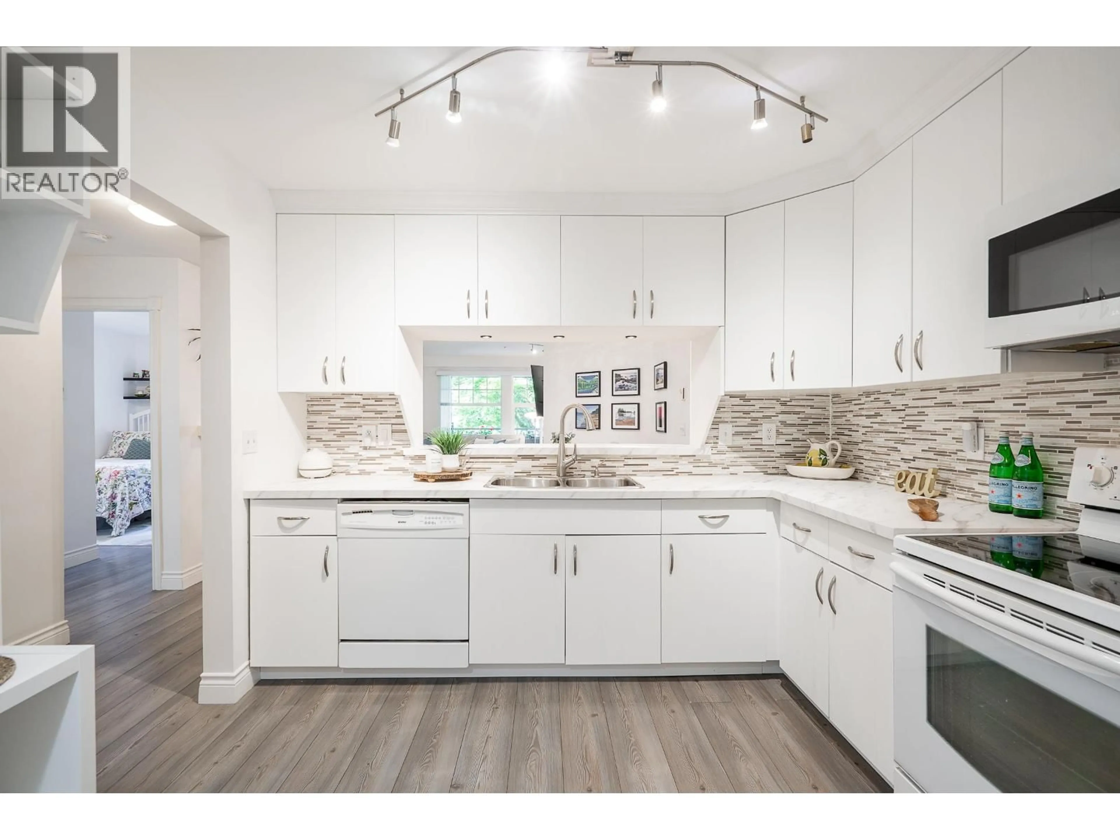 Open concept kitchen, unknown for 202 - 3075 PRIMROSE LANE, Coquitlam British Columbia V3B7S2
