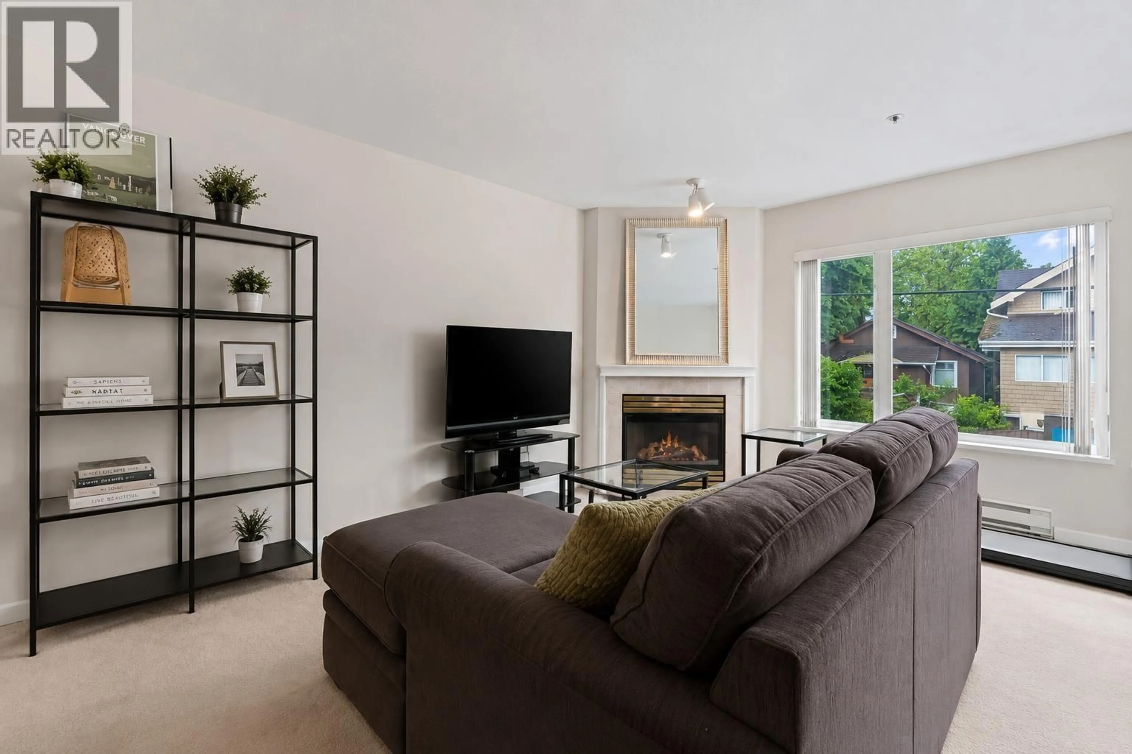 Living room with furniture, unknown for 108 - 3250 BROADWAY, Vancouver British Columbia V6K2H4