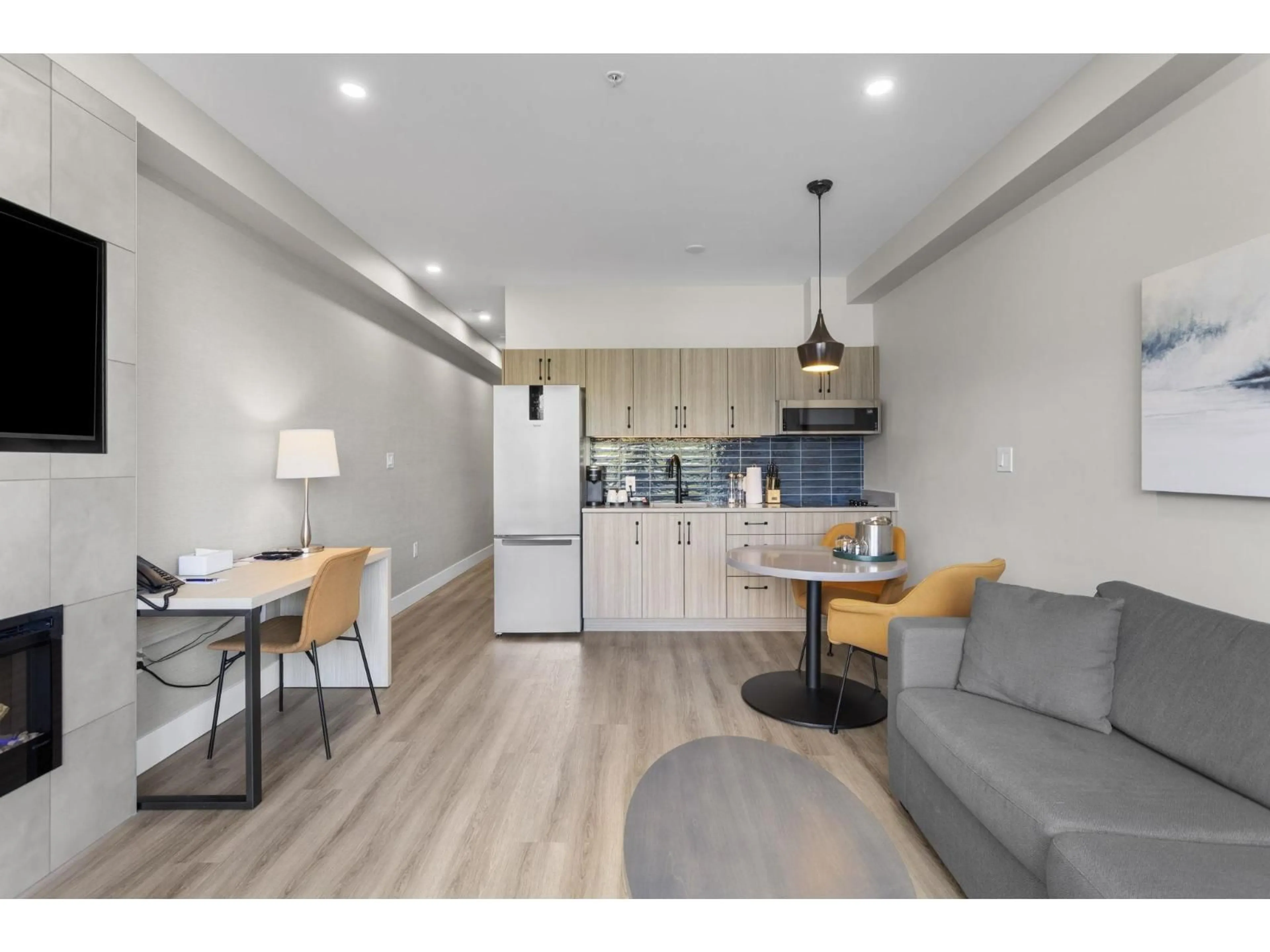 Open concept kitchen, wood/laminate floor for 206C - 160 ESPLANADE AVENUE, Harrison Hot Springs British Columbia V0M1K0