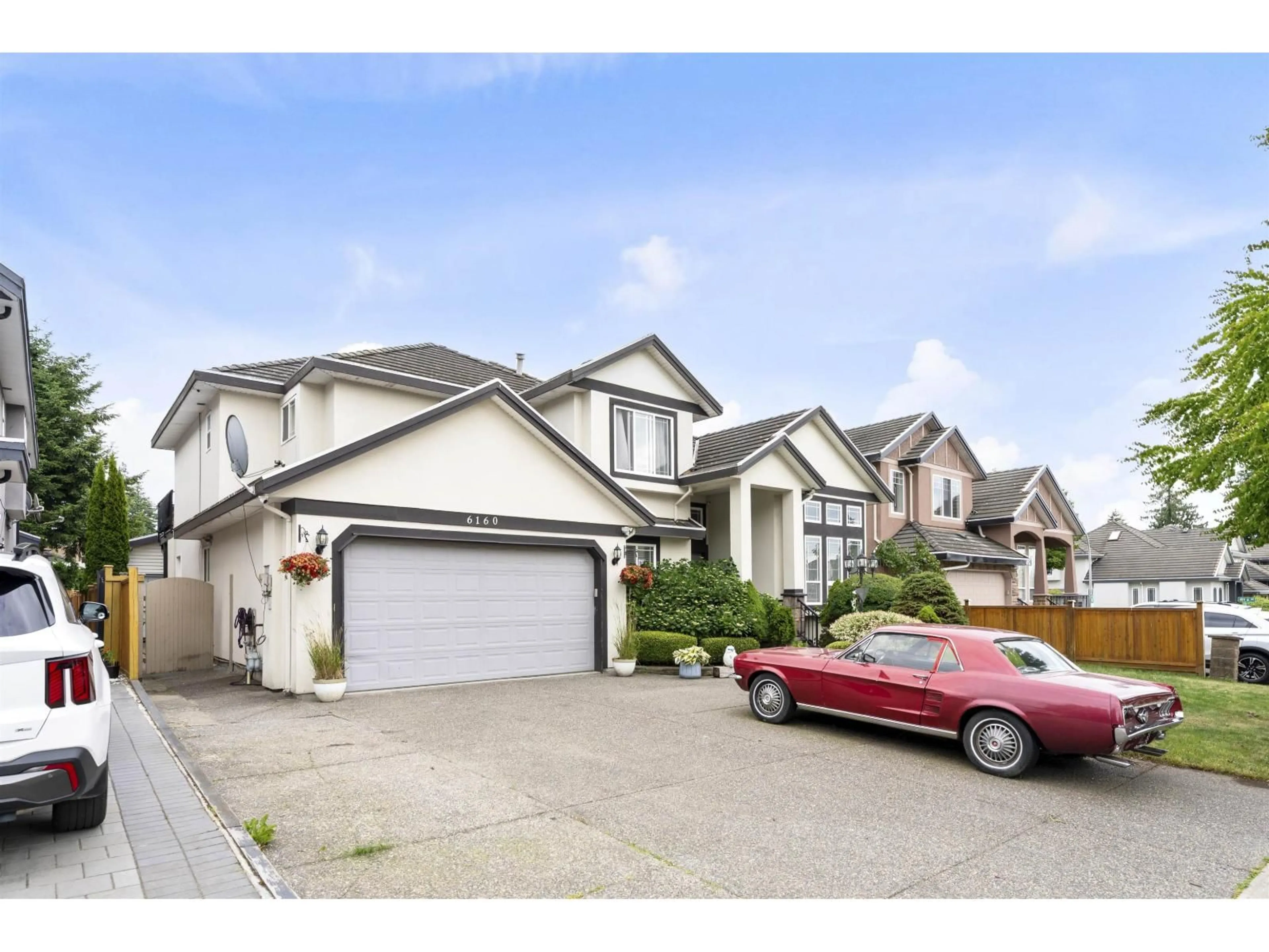 Home with vinyl exterior material, street for 6160 127 STREET, Surrey British Columbia V3X3M6