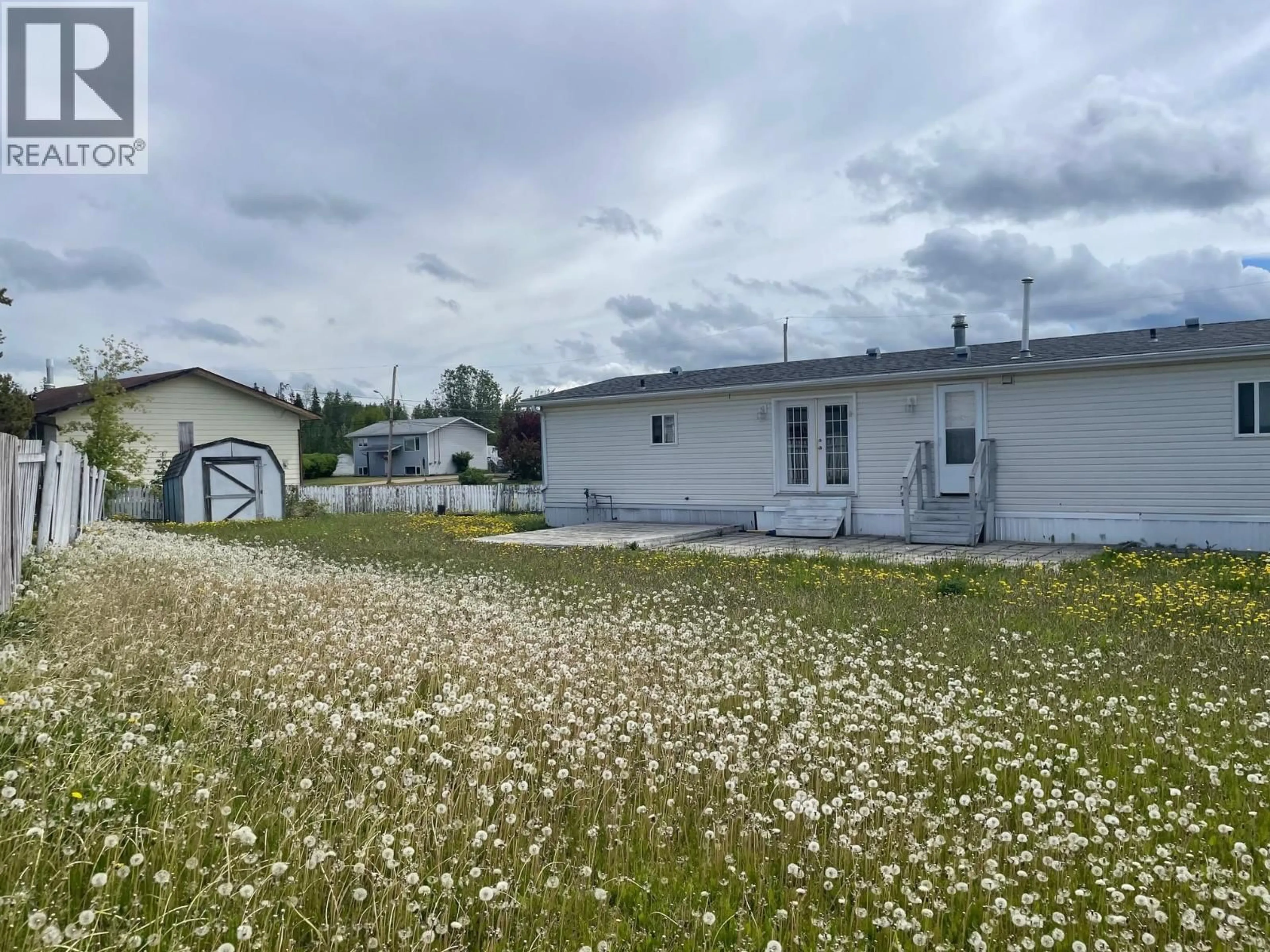 A pic from outside/outdoor area/front of a property/back of a property/a pic from drone, unknown for 5204 ASPEN CRESCENT, Fort Nelson British Columbia V0C1R0