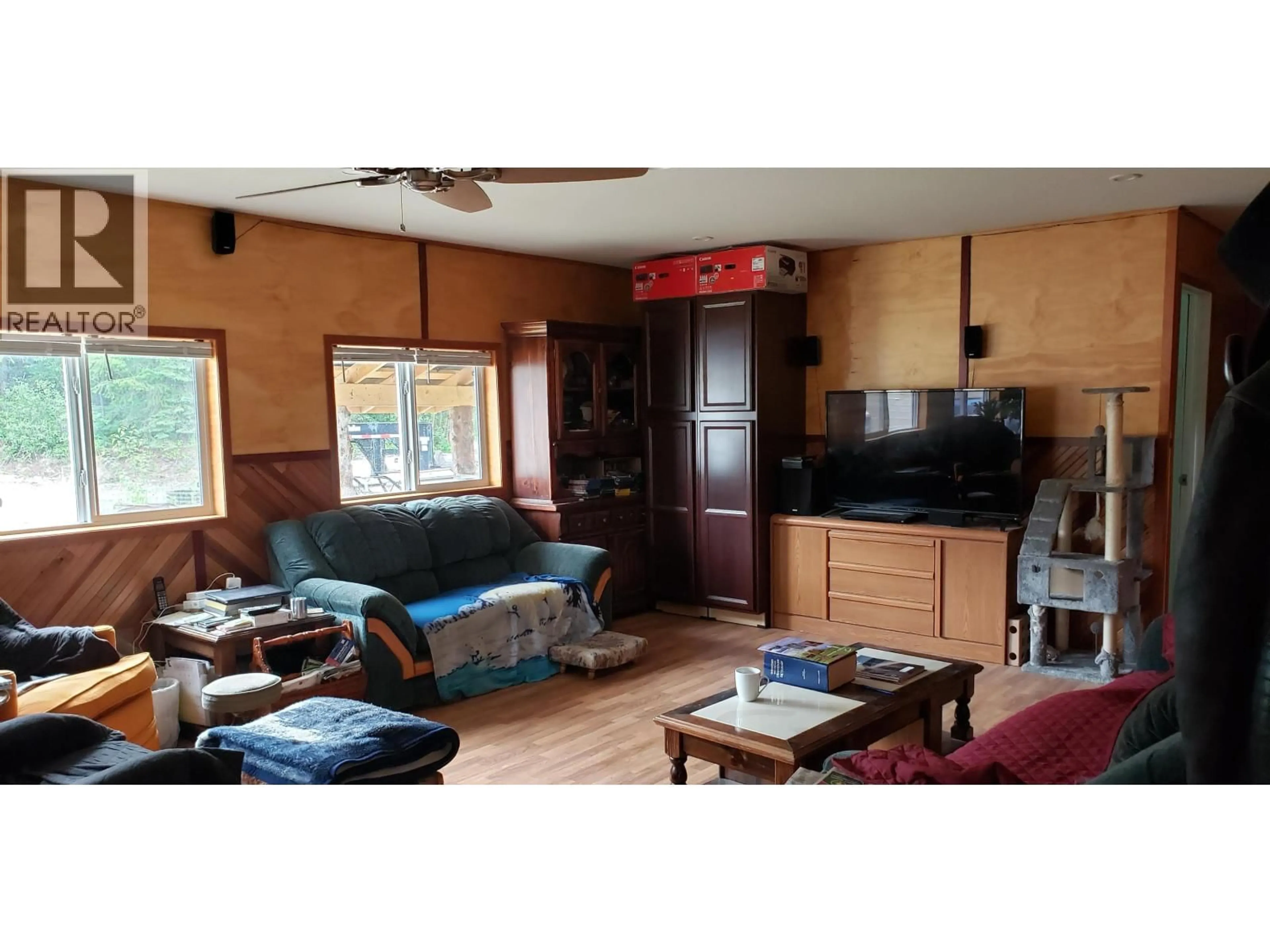 Living room with furniture, wood/laminate floor for 3724 BOWERS LAKE ROAD, Canim Lake British Columbia V0K1X3