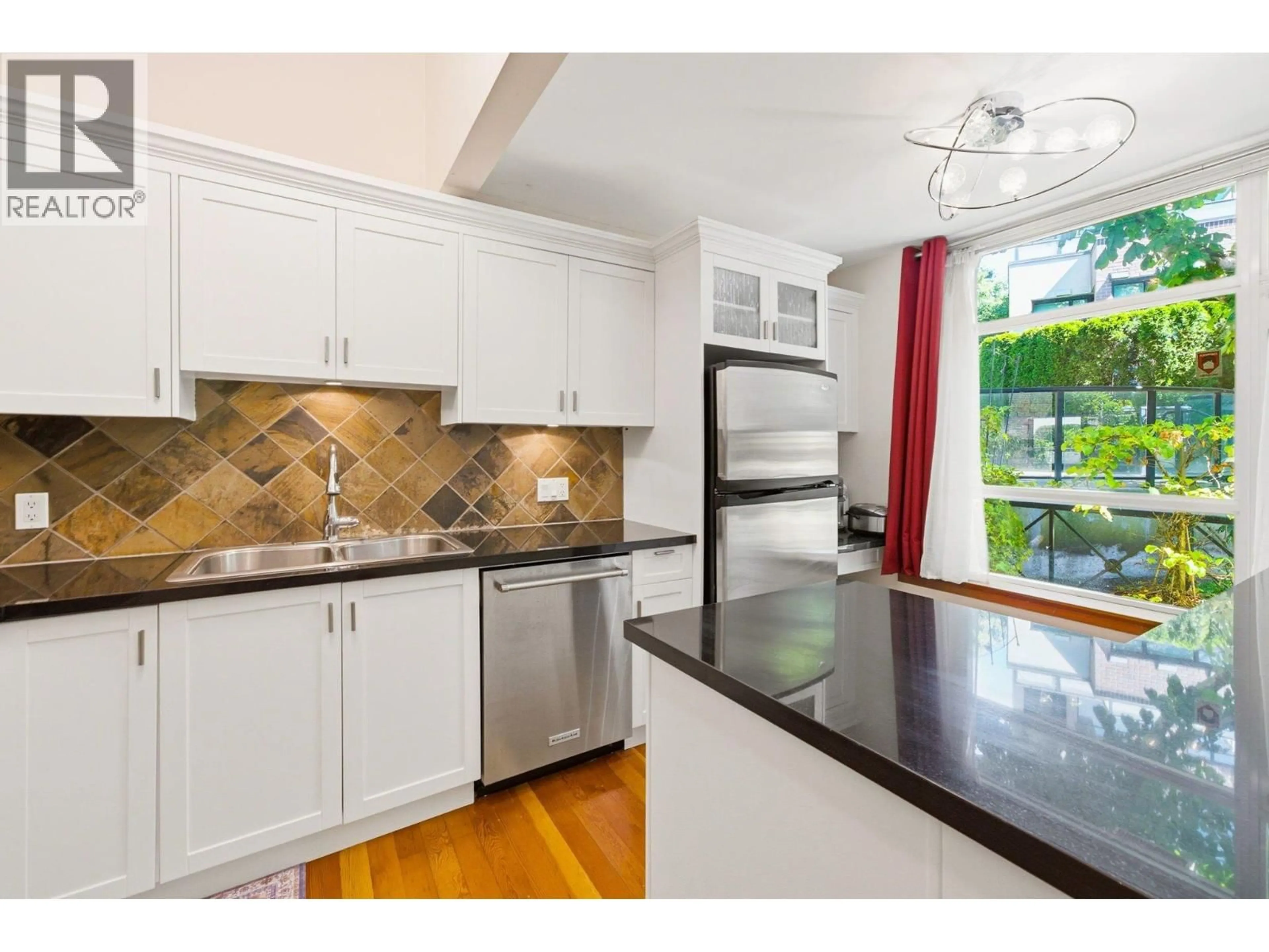 Open concept kitchen, unknown for 114 - 8 RENAISSANCE SQUARE, New Westminster British Columbia V3M7A9