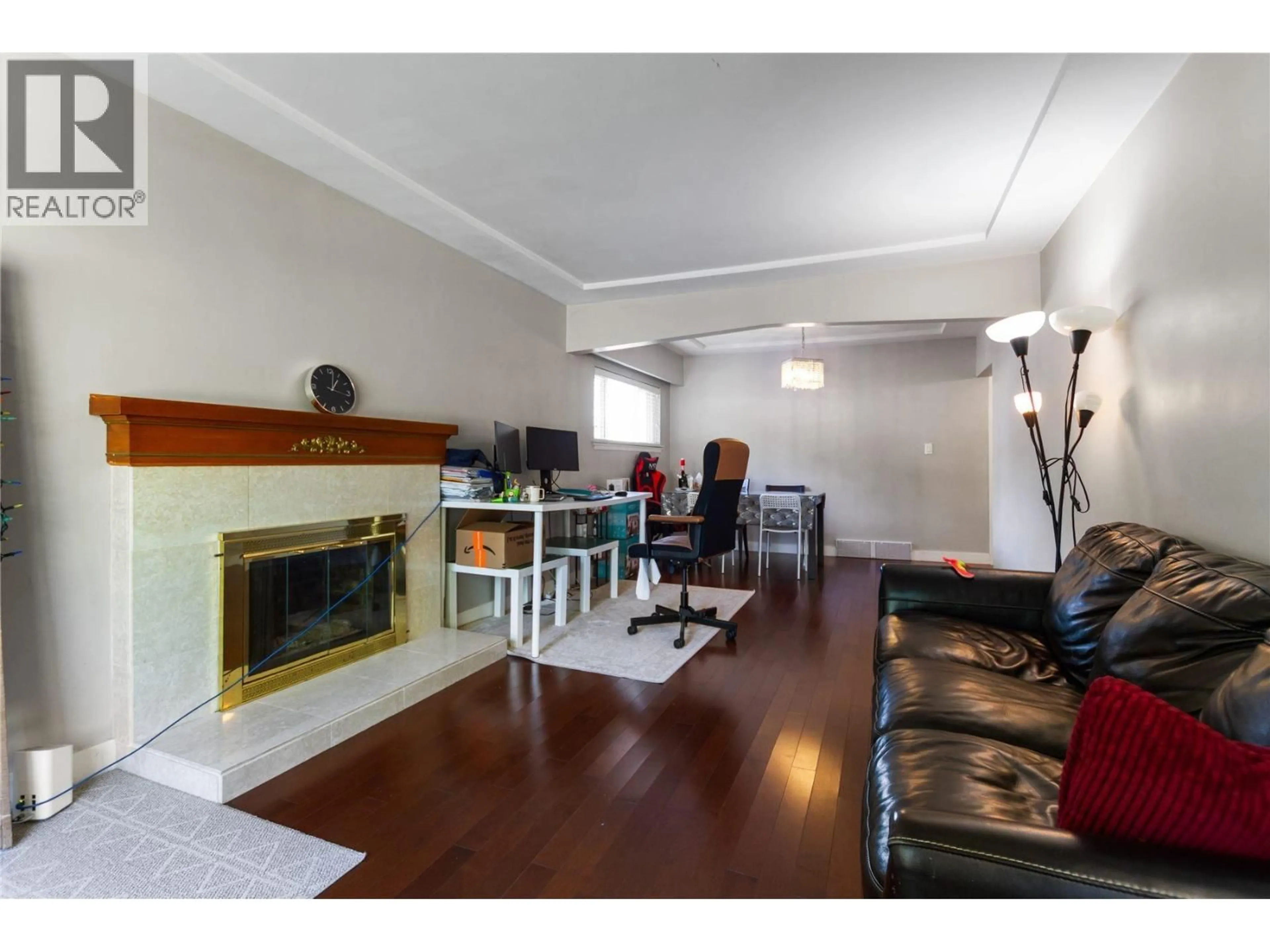 Living room with furniture, wood/laminate floor for 7643 SELKIRK STREET, Vancouver British Columbia V6P4H3