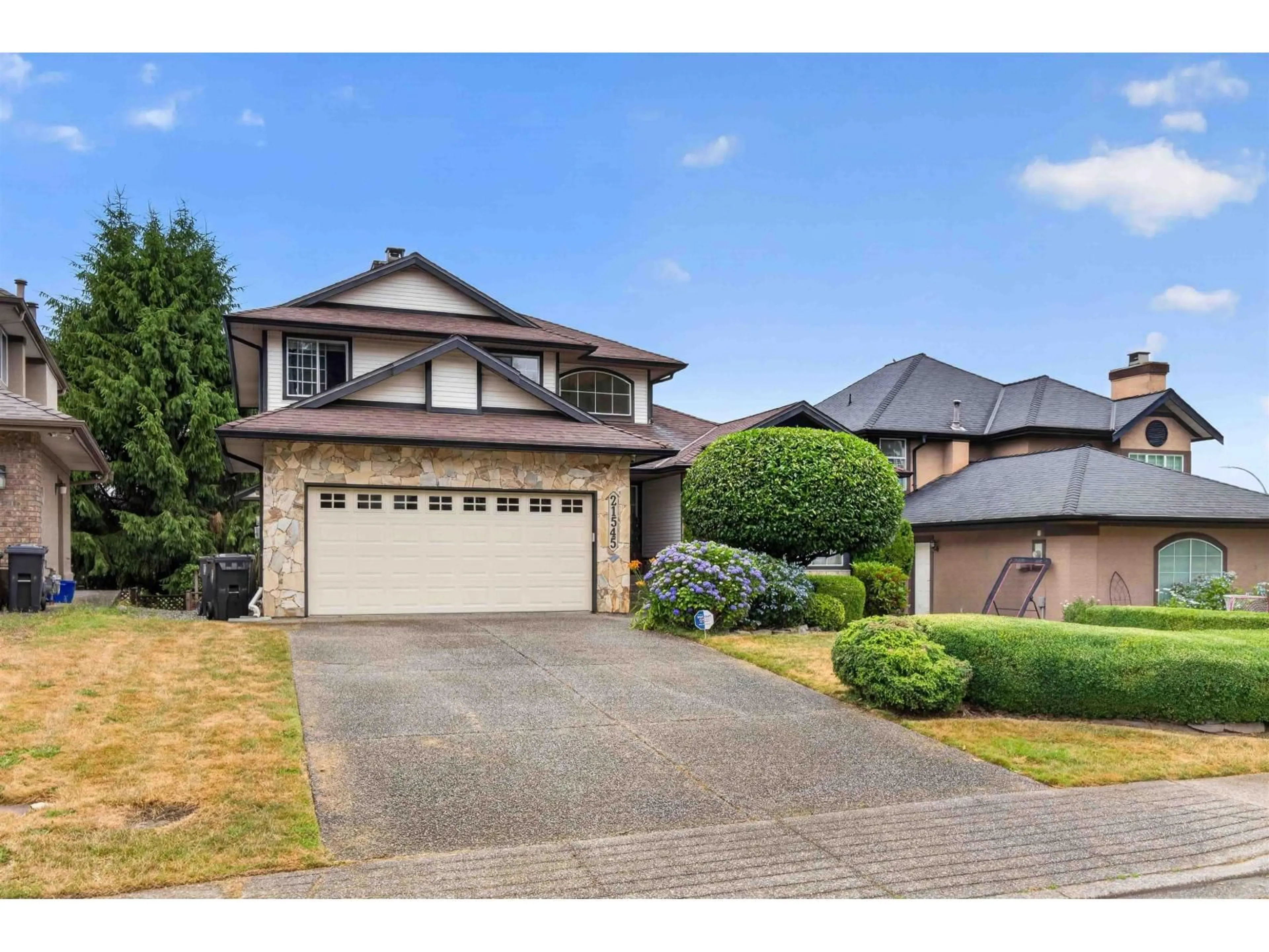 Home with vinyl exterior material, street for 21545 TELEGRAPH TRAIL, Langley British Columbia V1M2K8