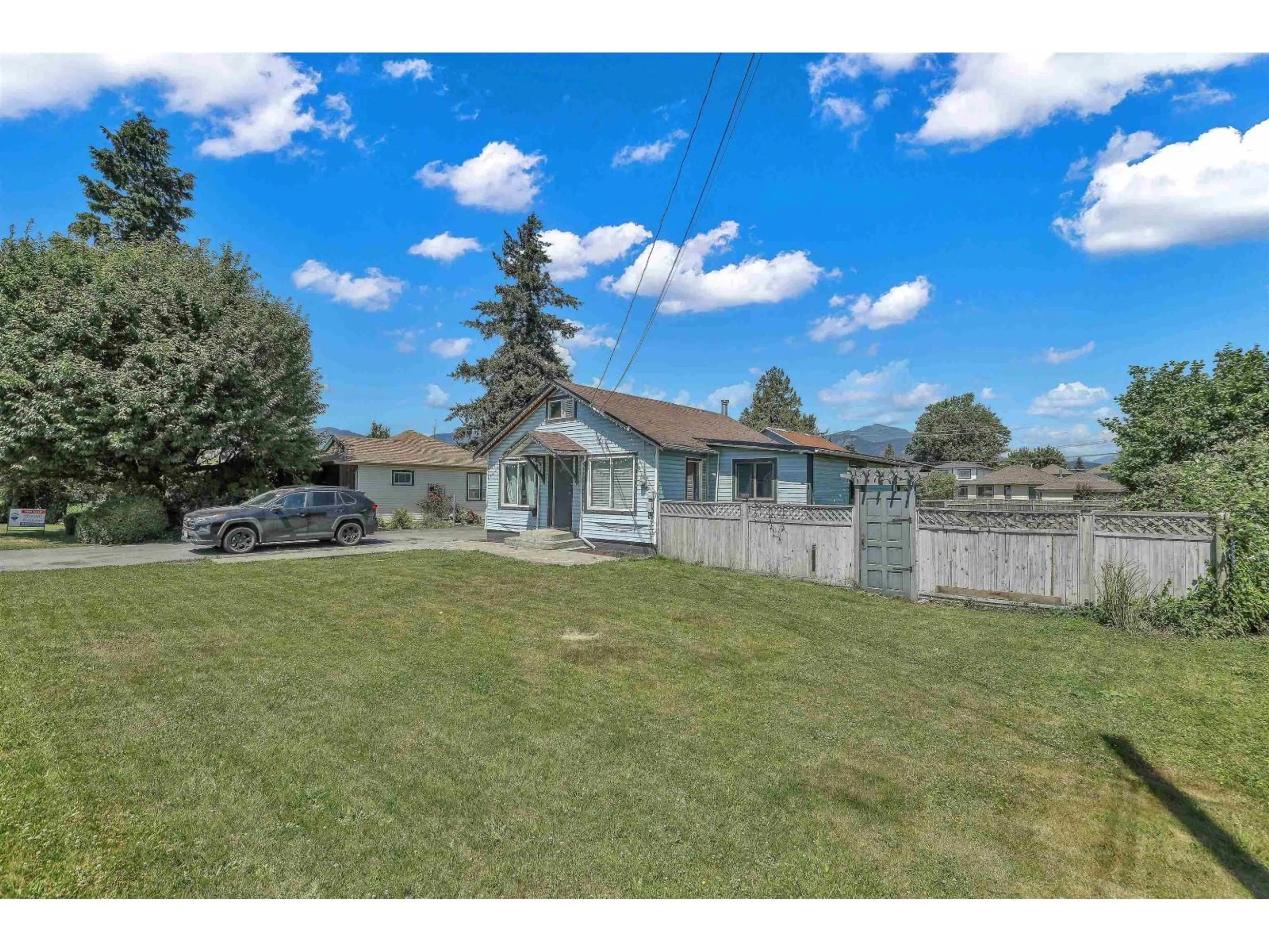 A pic from outside/outdoor area/front of a property/back of a property/a pic from drone, mountain view for 46045 FIFTH AVENUE, Chilliwack British Columbia V2P1M6