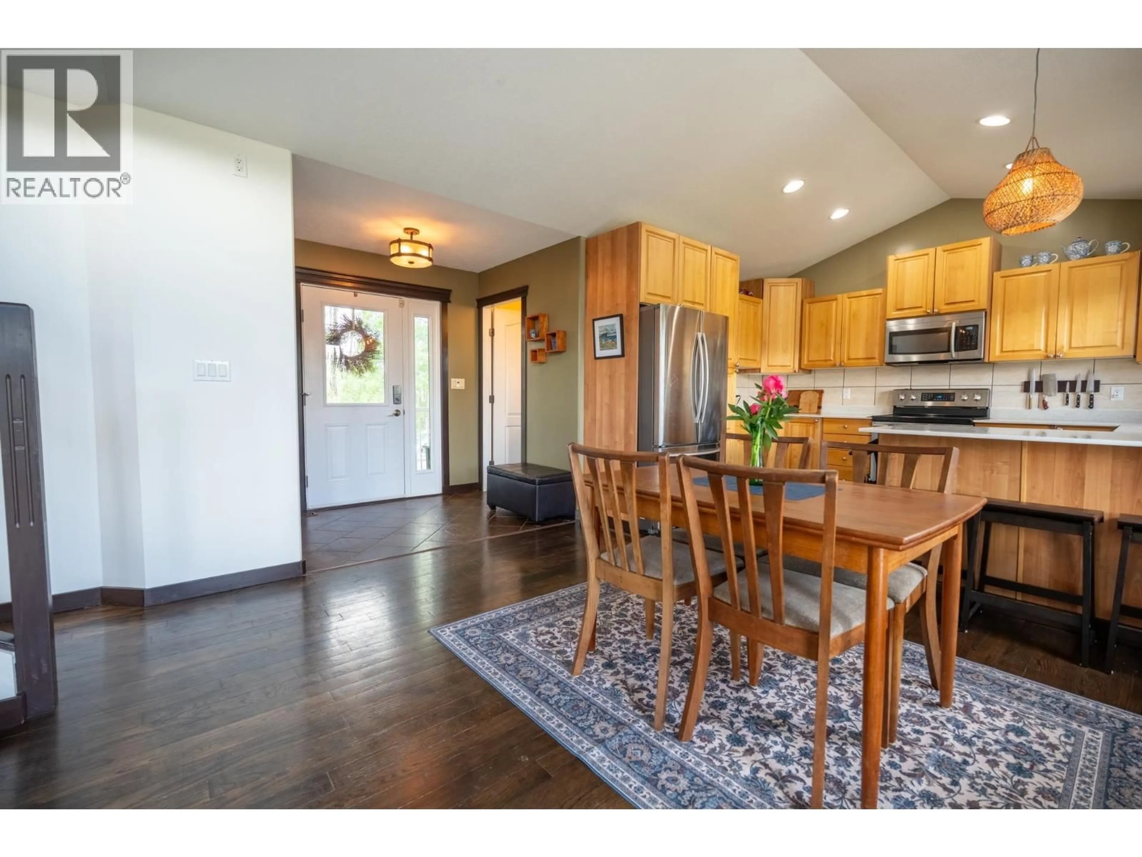 Open concept kitchen, wood/laminate floor for 10940 SALMON VALLEY ROAD, Prince George British Columbia V2K5T4