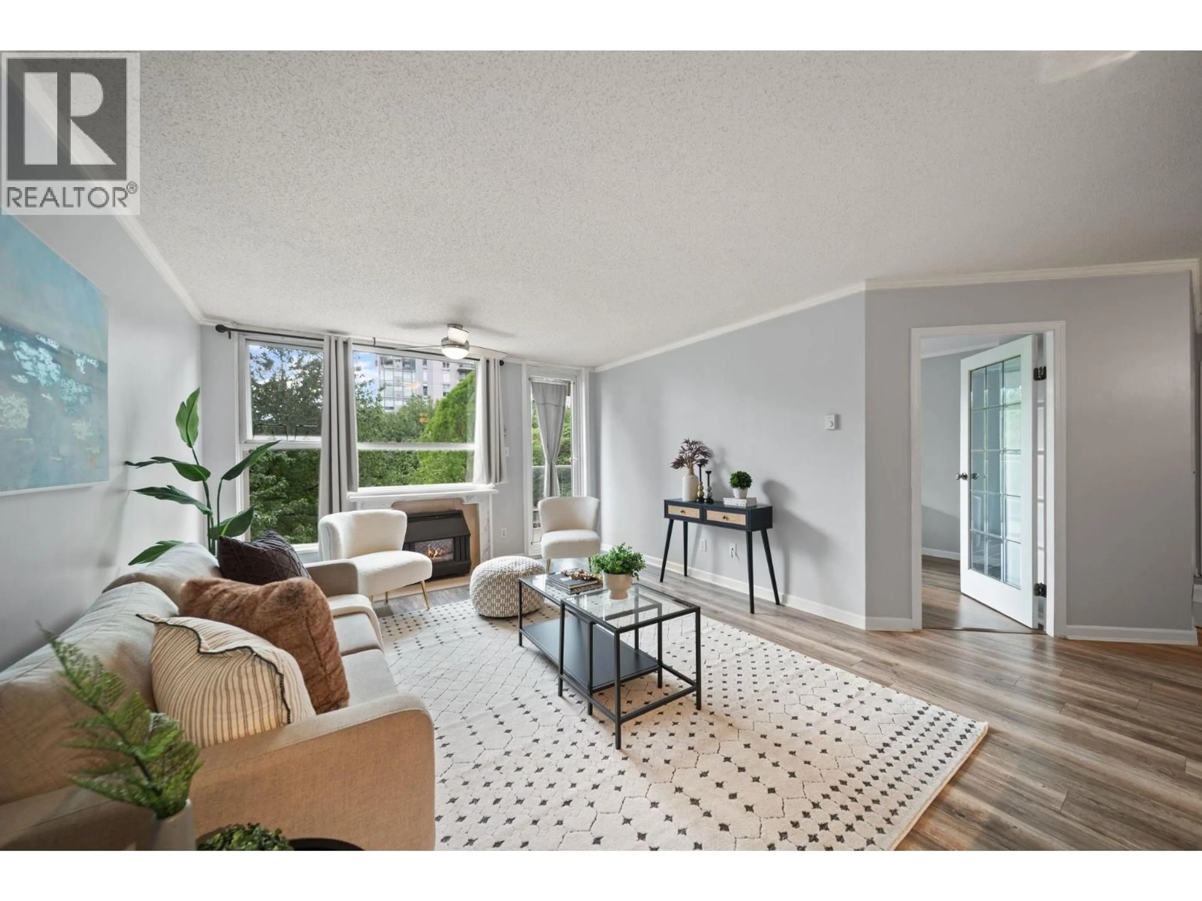 Living room with furniture, unknown for 305 - 1250 QUAYSIDE DRIVE, New Westminster British Columbia V3M6E2