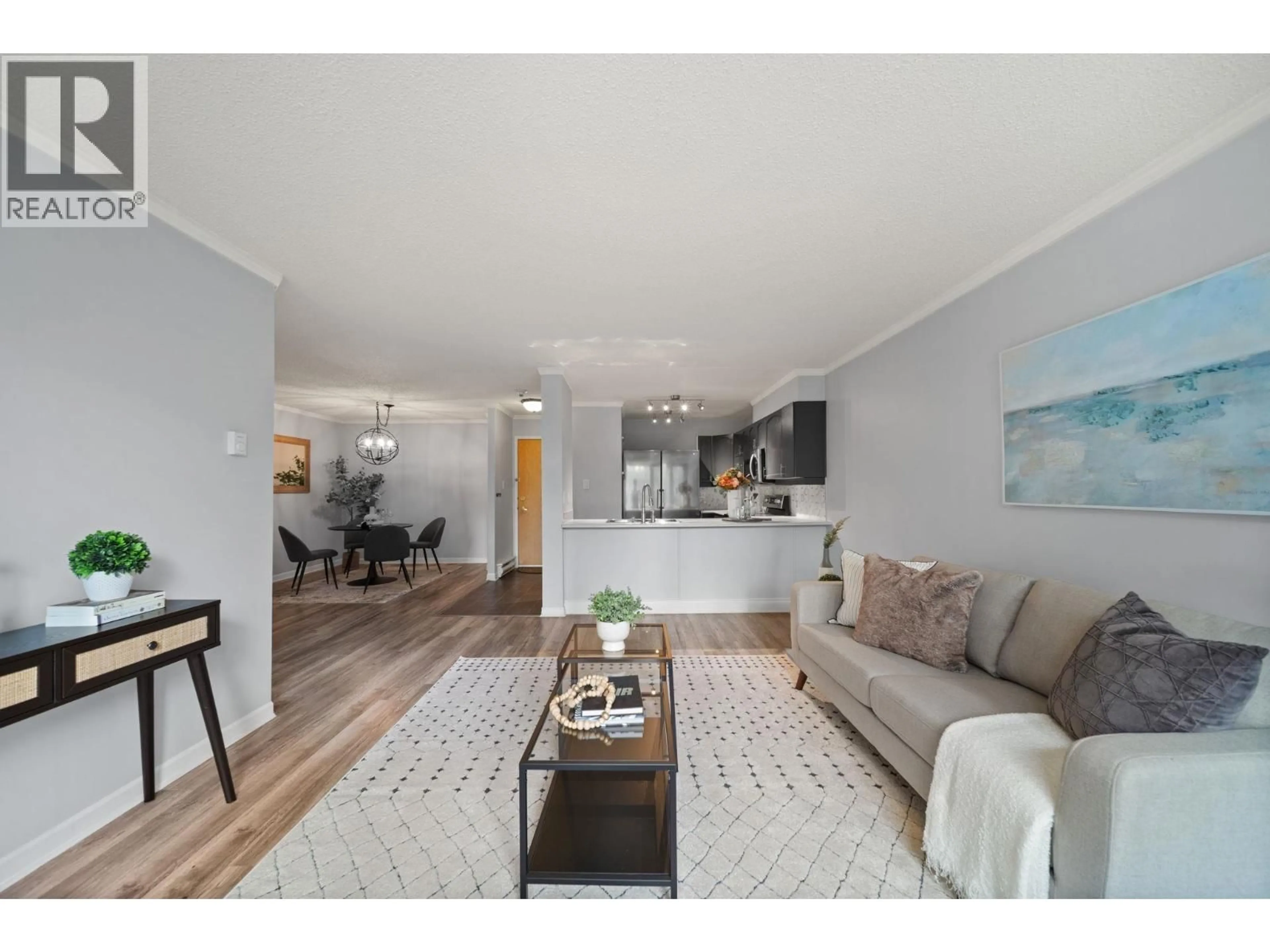 Living room with furniture, wood/laminate floor for 305 - 1250 QUAYSIDE DRIVE, New Westminster British Columbia V3M6E2