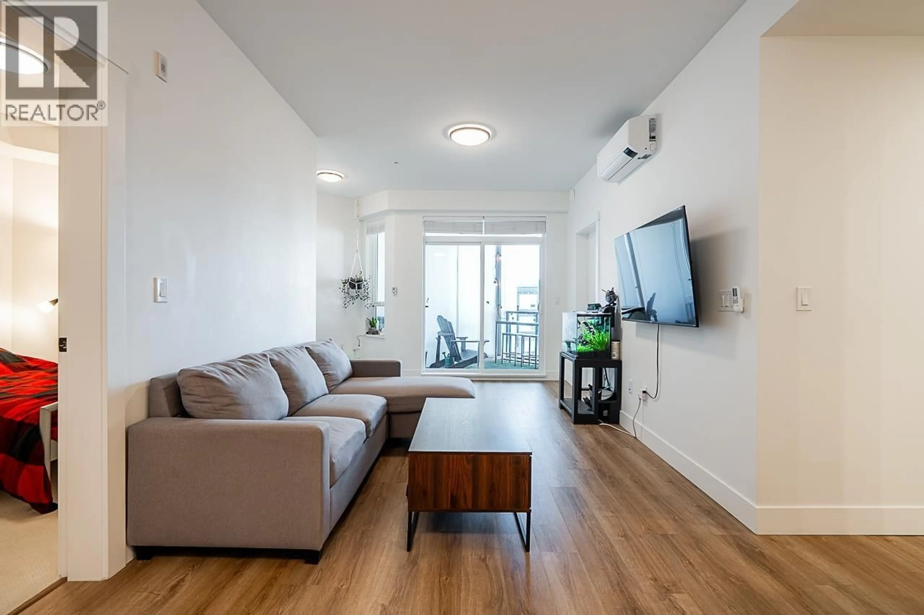Living room with furniture, wood/laminate floor for 1608 - 2180 KELLY AVENUE, Port Coquitlam British Columbia V3C0S6