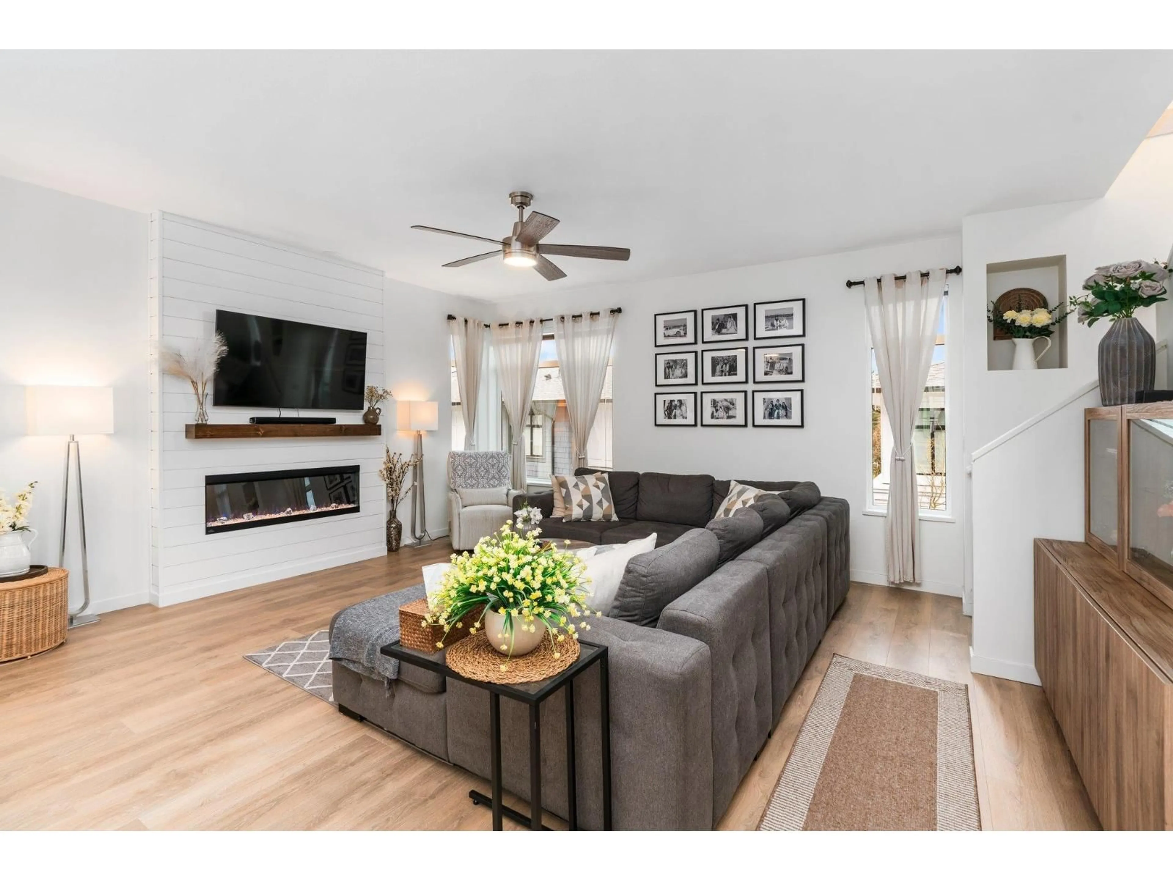 Living room with furniture, wood/laminate floor for 41 - 15235 SITKA DRIVE, Surrey British Columbia V3S0A9