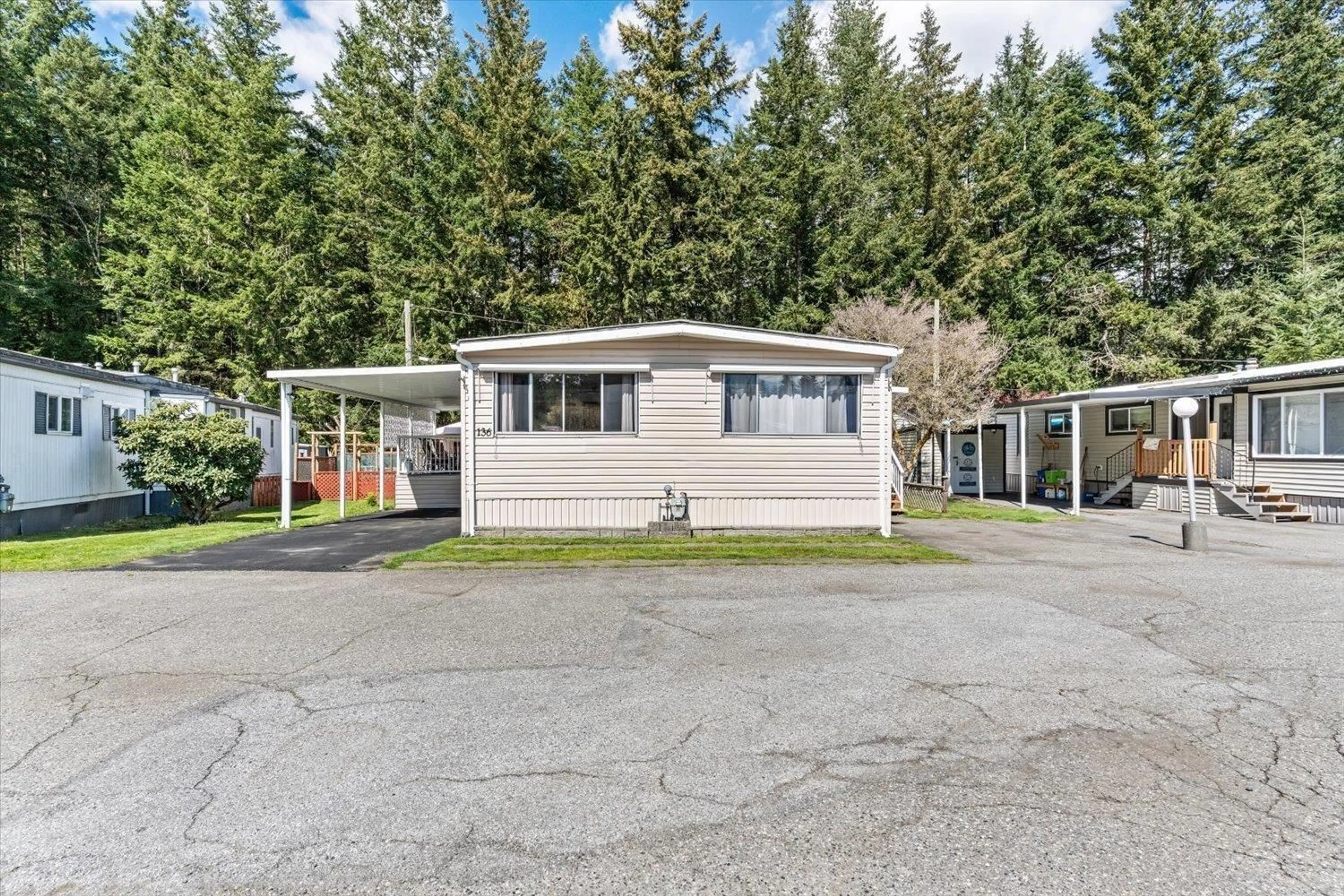 Home with vinyl exterior material, street for 136 - 3031 200 STREET, Langley British Columbia V2Z1N5