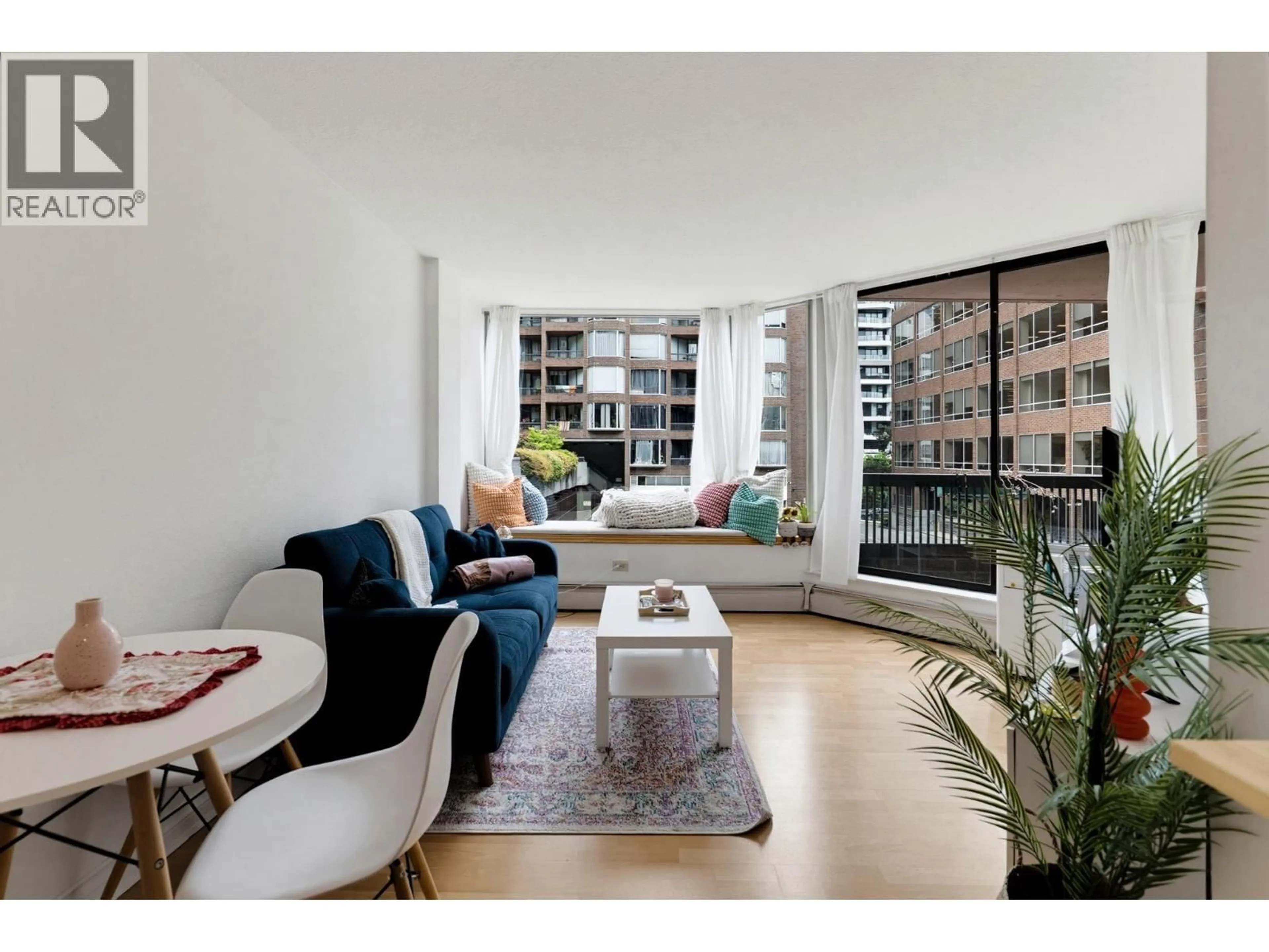 Living room with furniture, unknown for 214 - 1330 BURRARD STREET, Vancouver British Columbia V6Z2B8