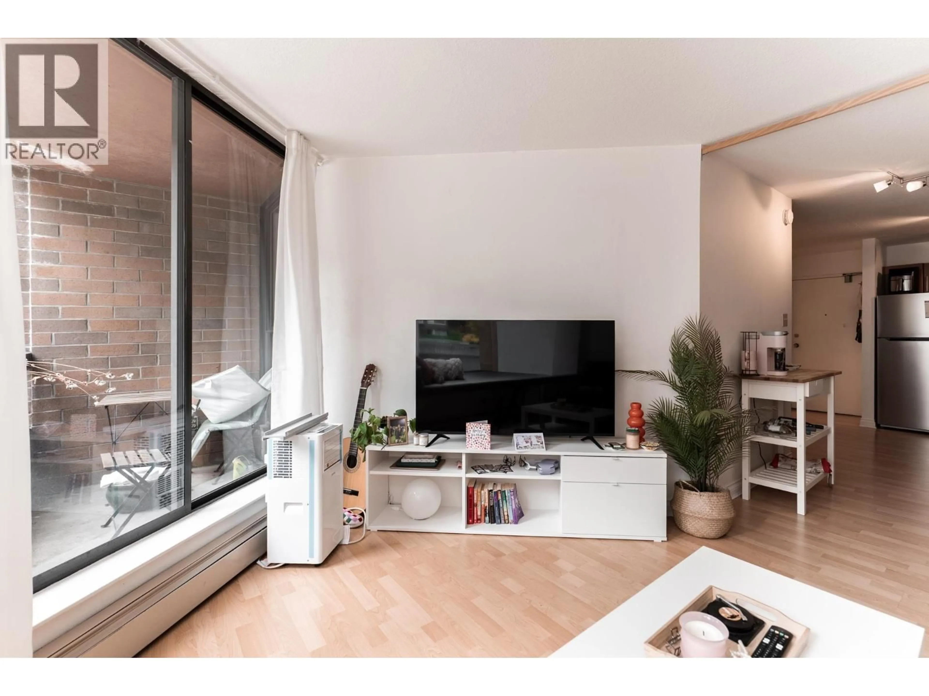 Living room with furniture, unknown for 214 - 1330 BURRARD STREET, Vancouver British Columbia V6Z2B8