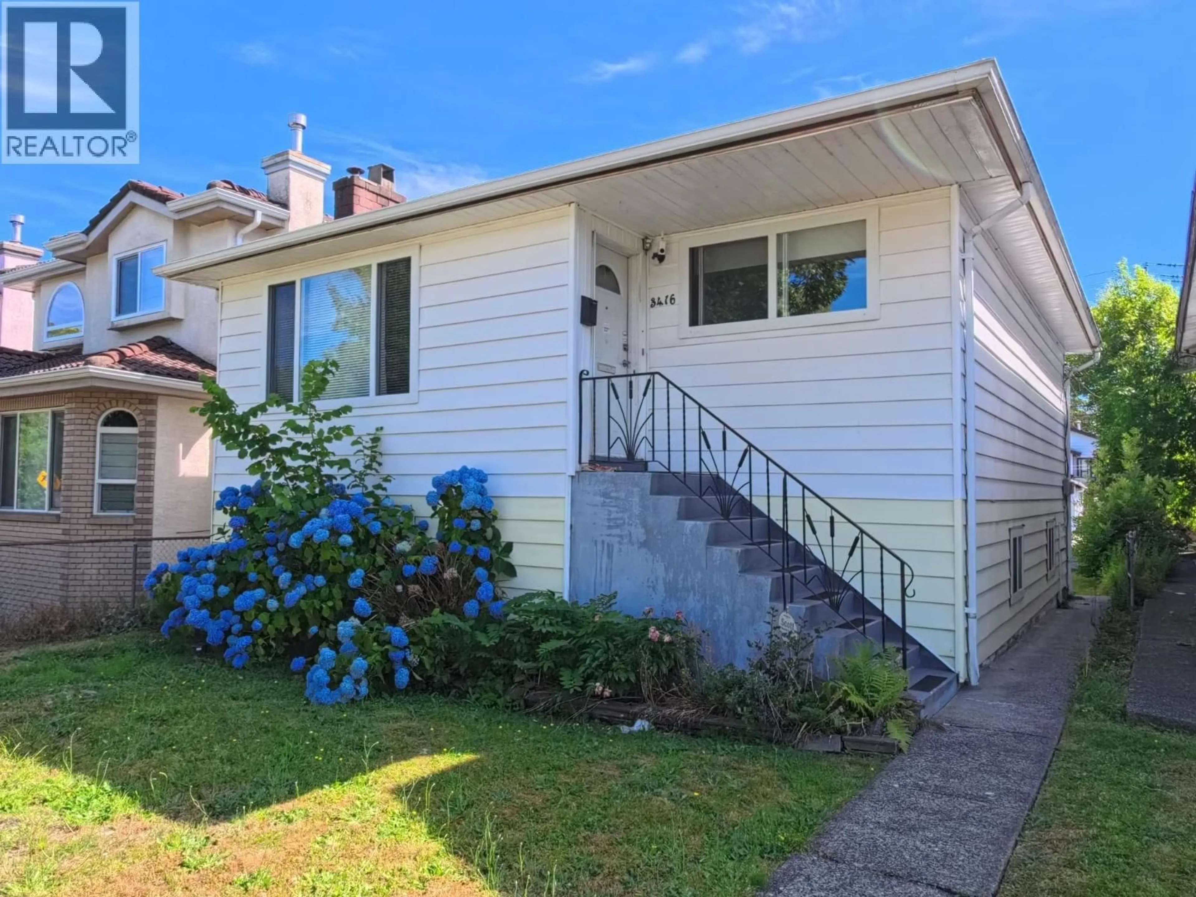 Home with vinyl exterior material, street for 3416 MONMOUTH AVENUE, Vancouver British Columbia V5R5R9