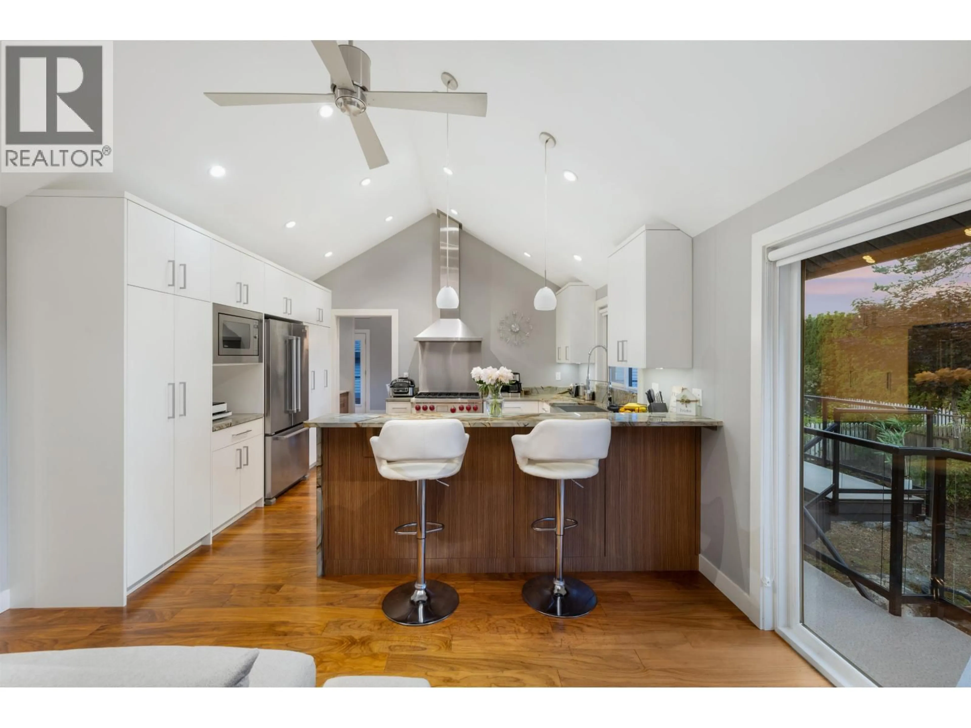 Open concept kitchen, wood/laminate floor for 4786 MEADFEILD COURT, West Vancouver British Columbia V7W2Y3