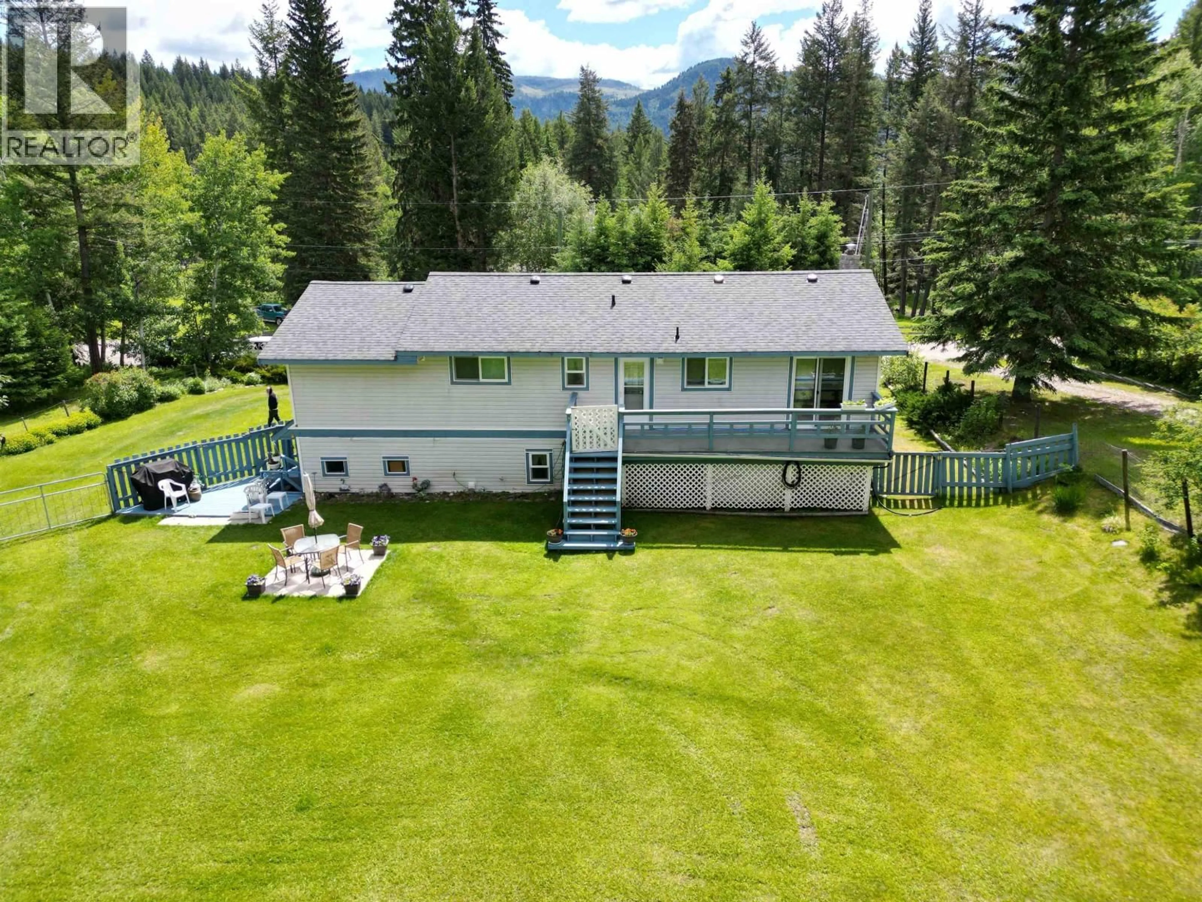 A pic from outside/outdoor area/front of a property/back of a property/a pic from drone, mountain view for 4310 KOKANEE ROAD, 100 Mile House British Columbia V0K1J0