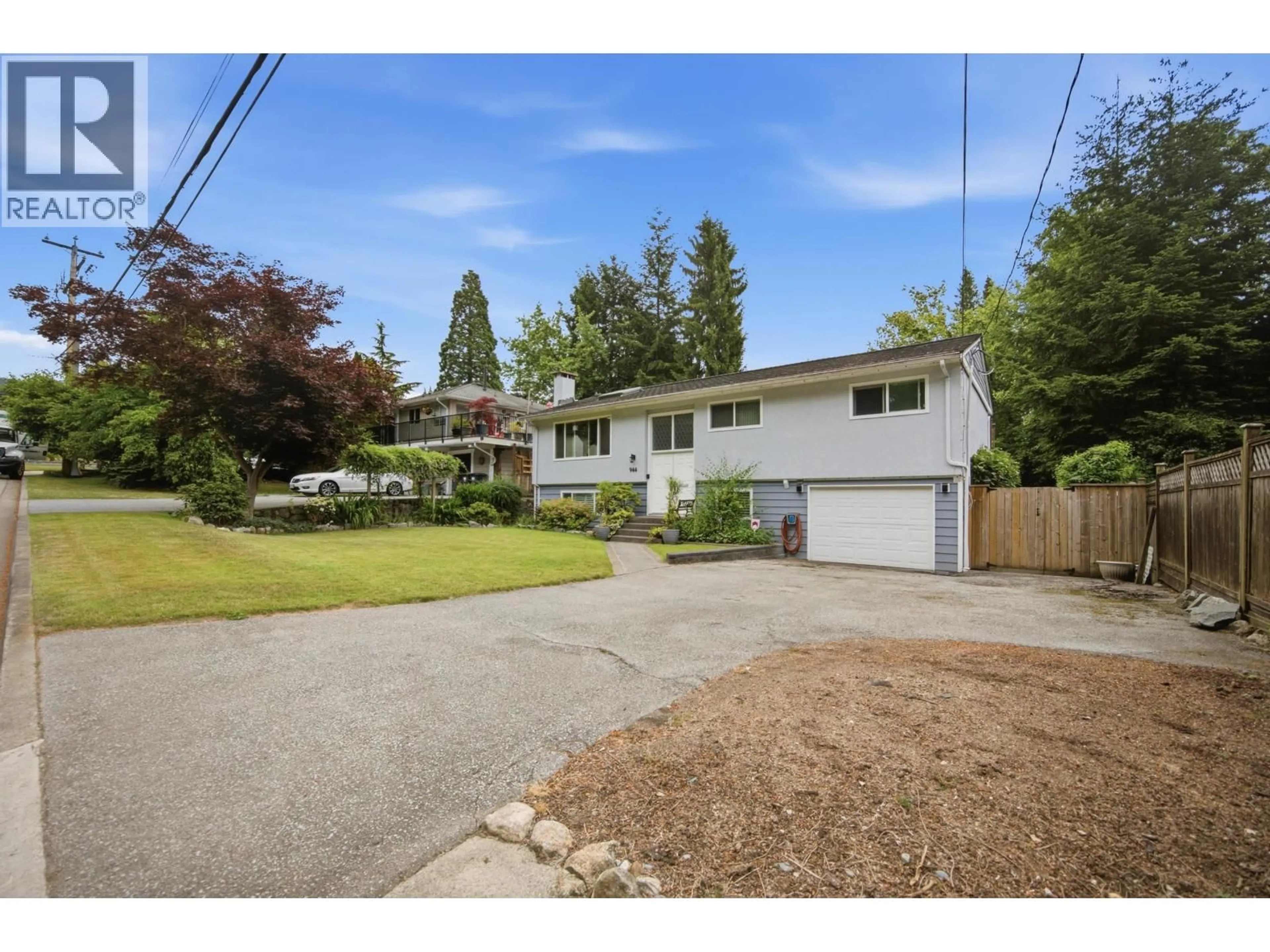 A pic from outside/outdoor area/front of a property/back of a property/a pic from drone, street for 944 TOLLCROSS ROAD, North Vancouver British Columbia V7H2G2