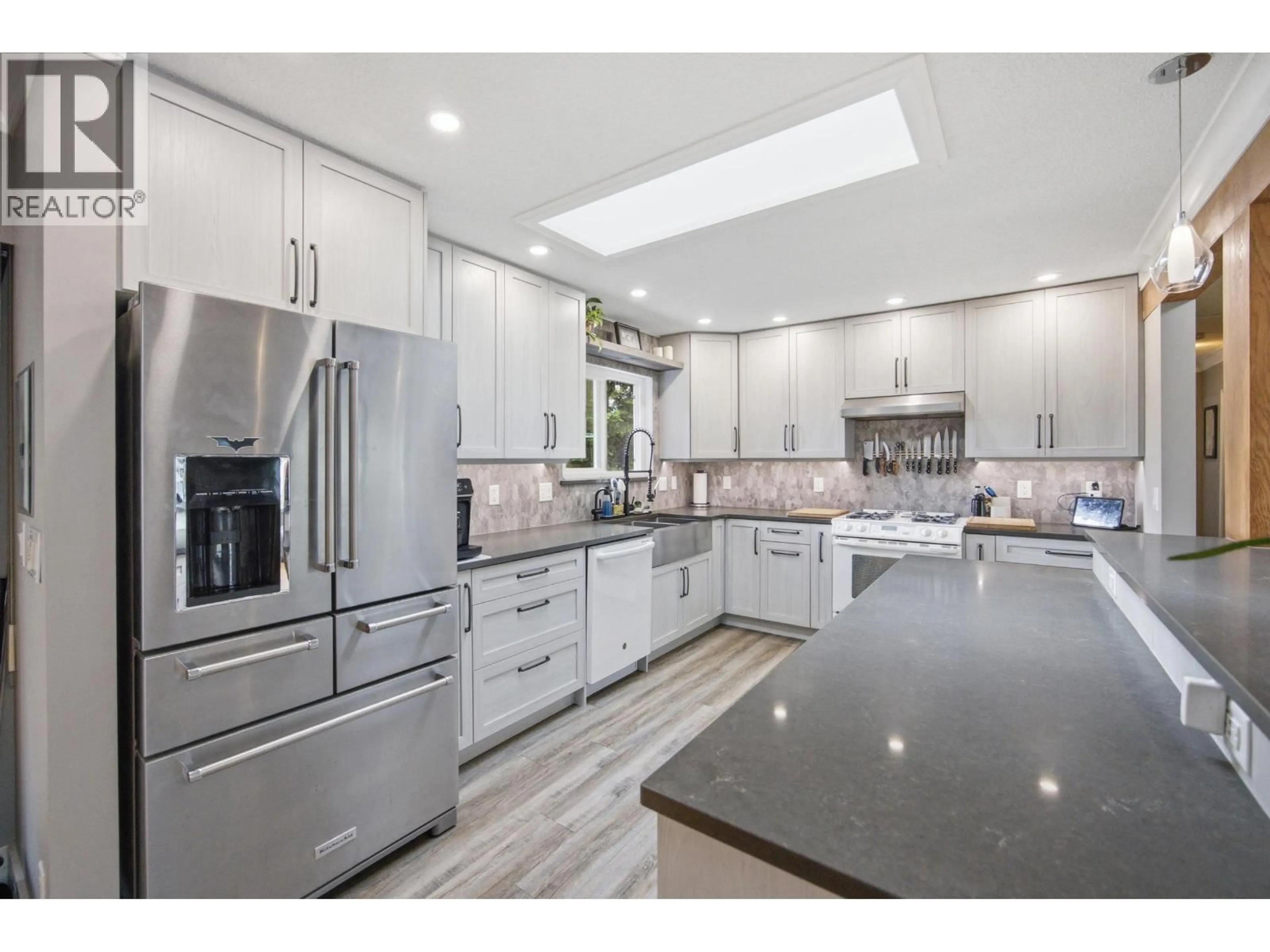 Contemporary kitchen, ceramic/tile floor for 944 TOLLCROSS ROAD, North Vancouver British Columbia V7H2G2