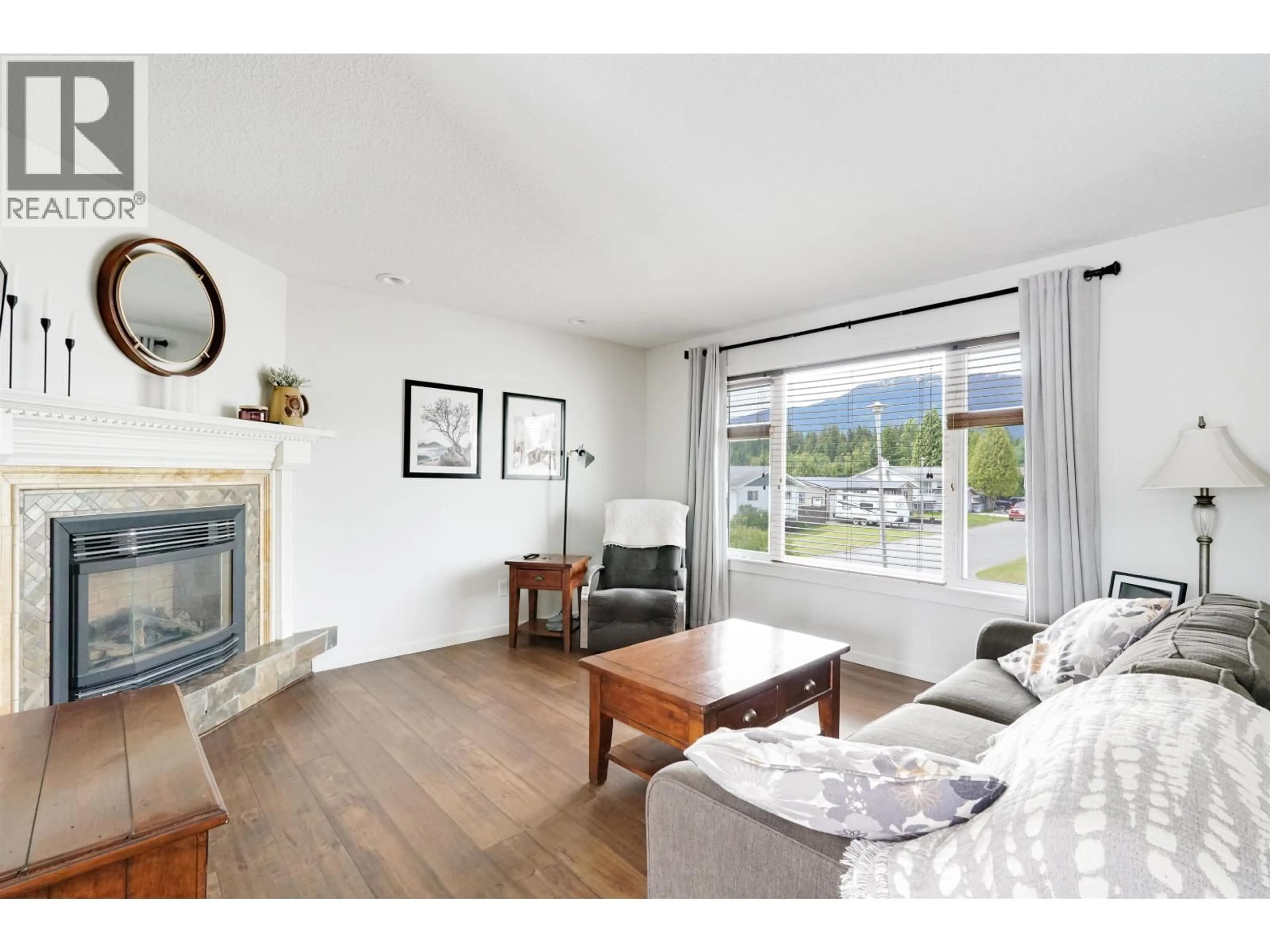 Living room with furniture, wood/laminate floor for 19 CARLSON STREET, Kitimat British Columbia V8C1A9