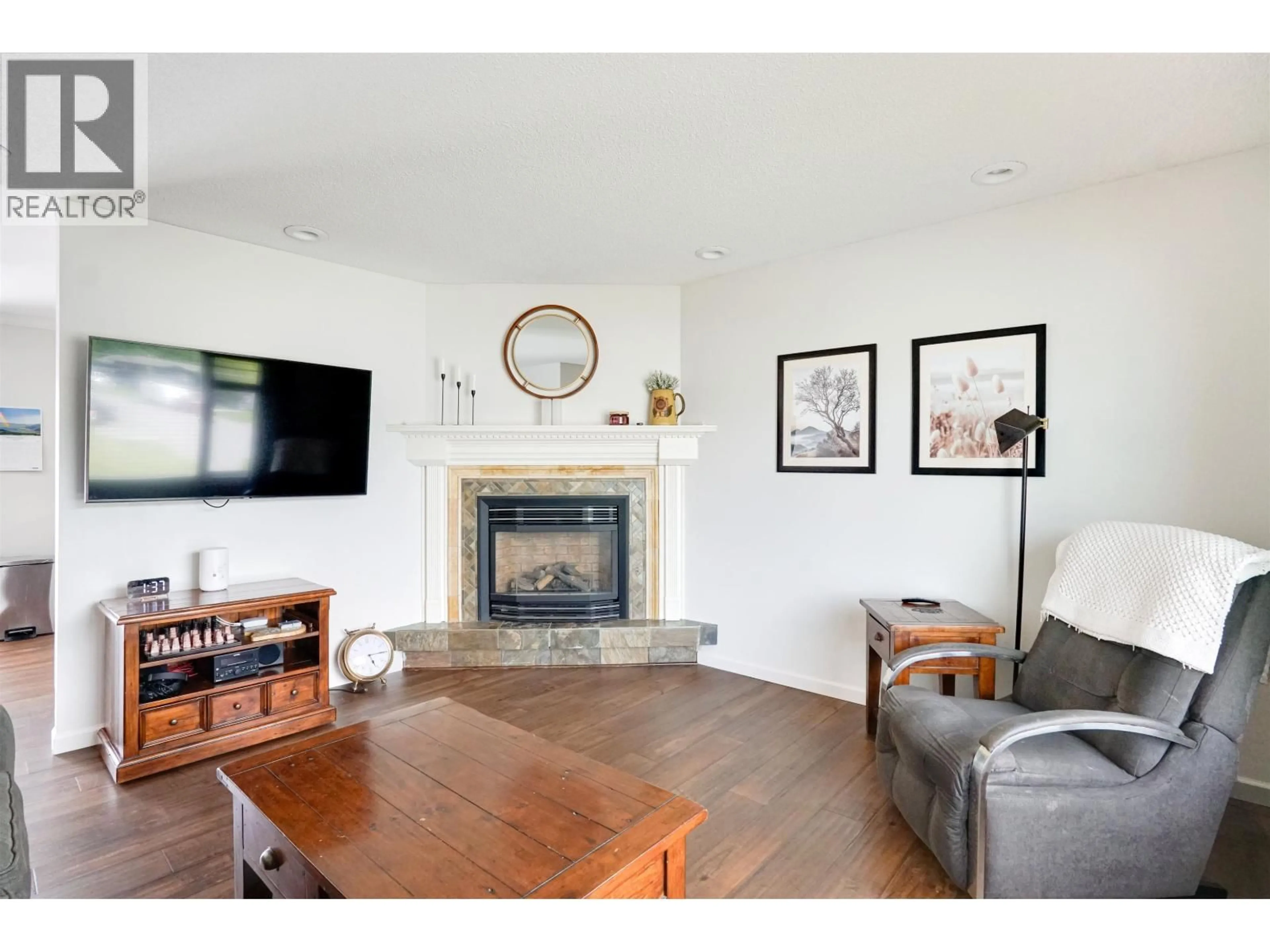 Living room with furniture, wood/laminate floor for 19 CARLSON STREET, Kitimat British Columbia V8C1A9