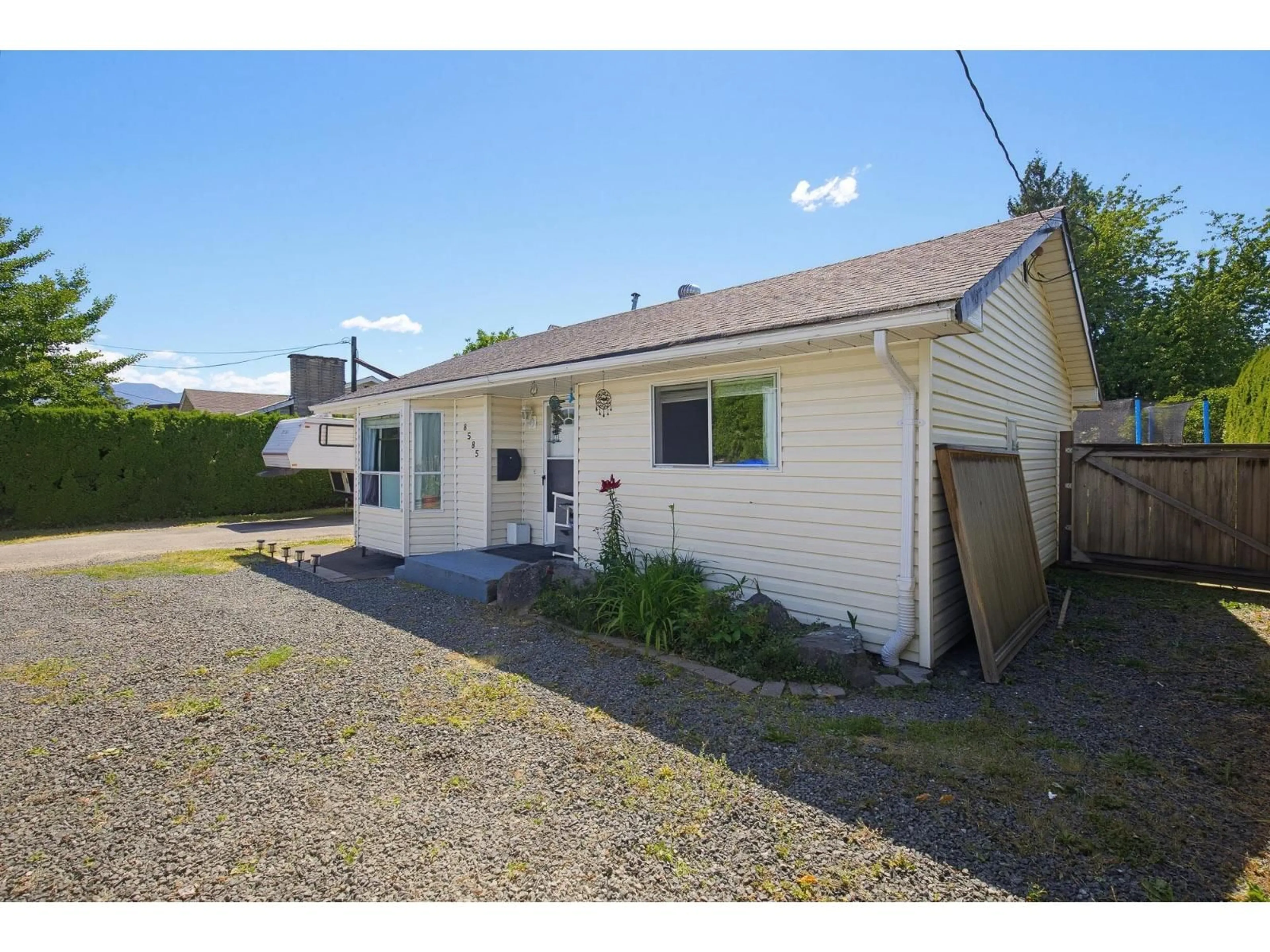 A pic from outside/outdoor area/front of a property/back of a property/a pic from drone, street for 8585 BROADWAY STREET, Chilliwack British Columbia V2P5V4