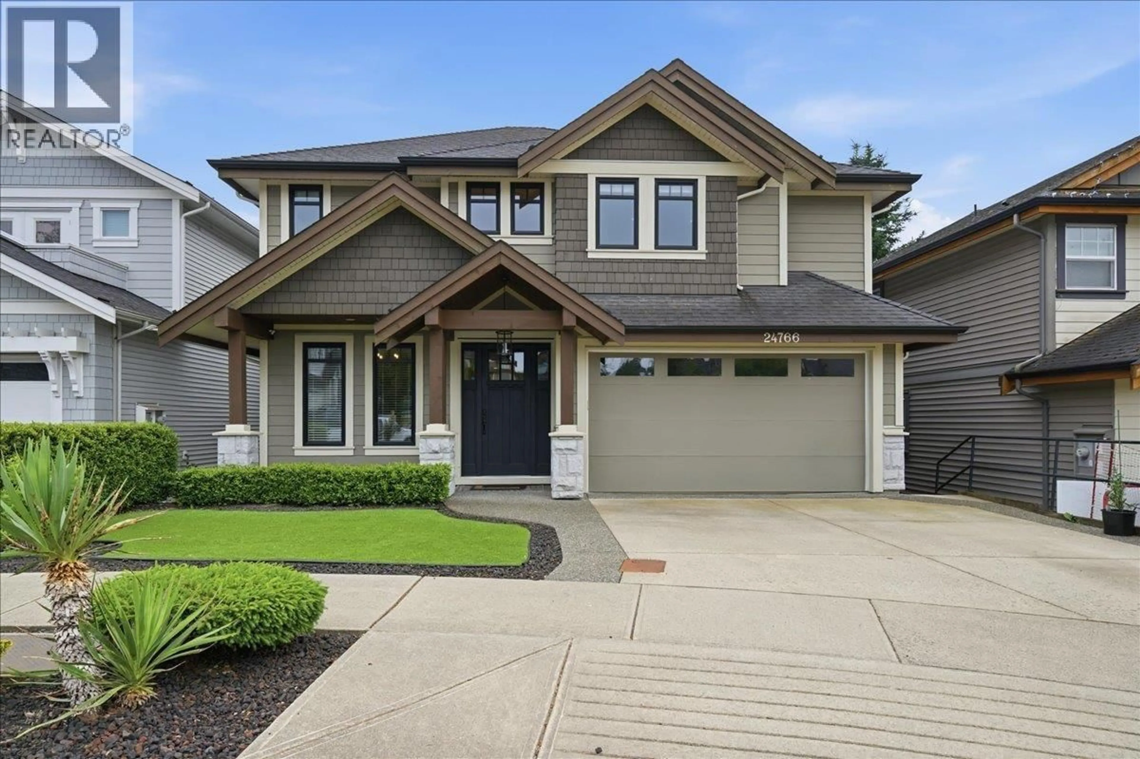 Home with vinyl exterior material, street for 24766 100A AVENUE, Maple Ridge British Columbia V2W0H1