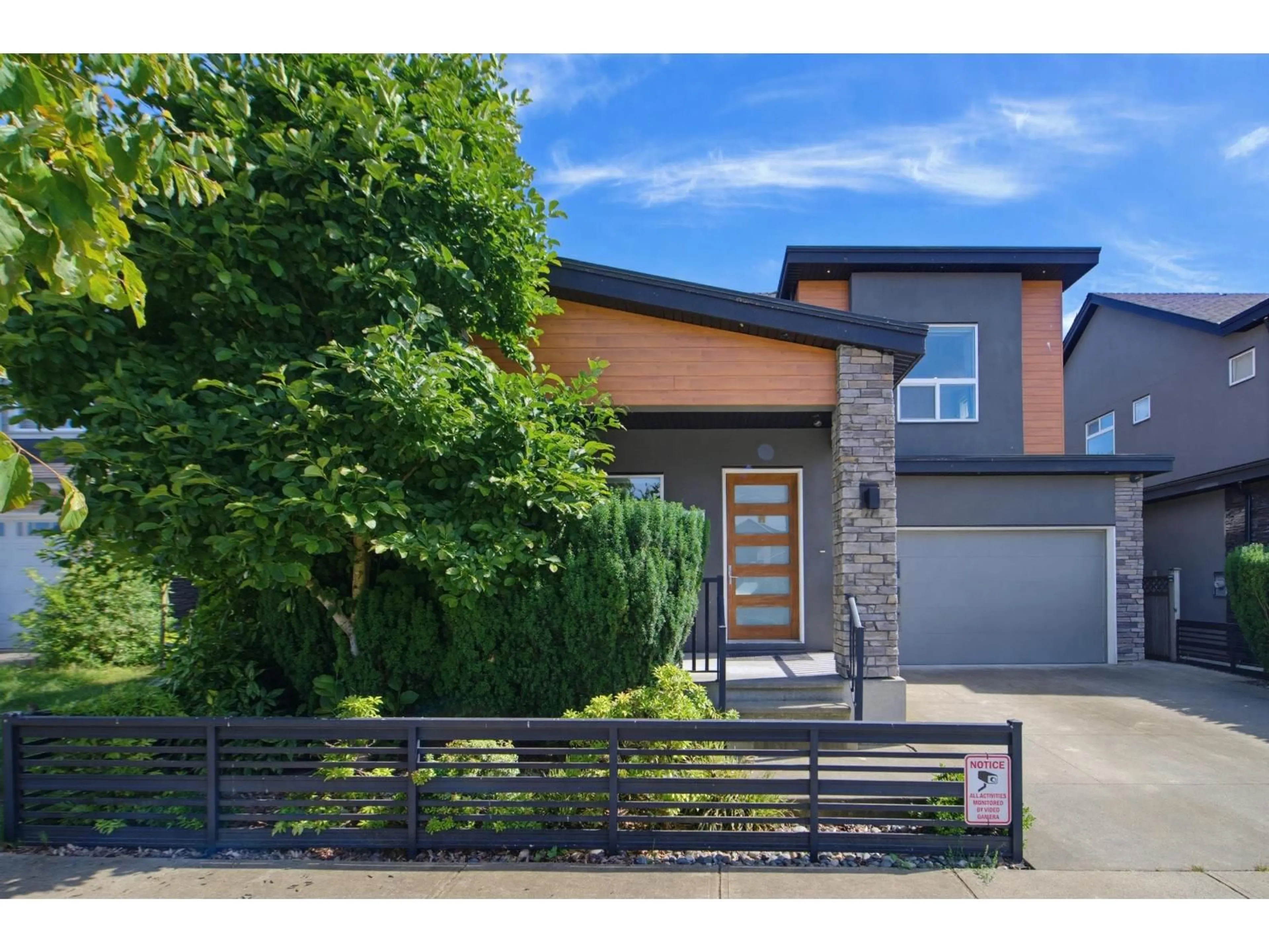 Home with brick exterior material, street for 15868 105A AVENUE, Surrey British Columbia V4N3J4