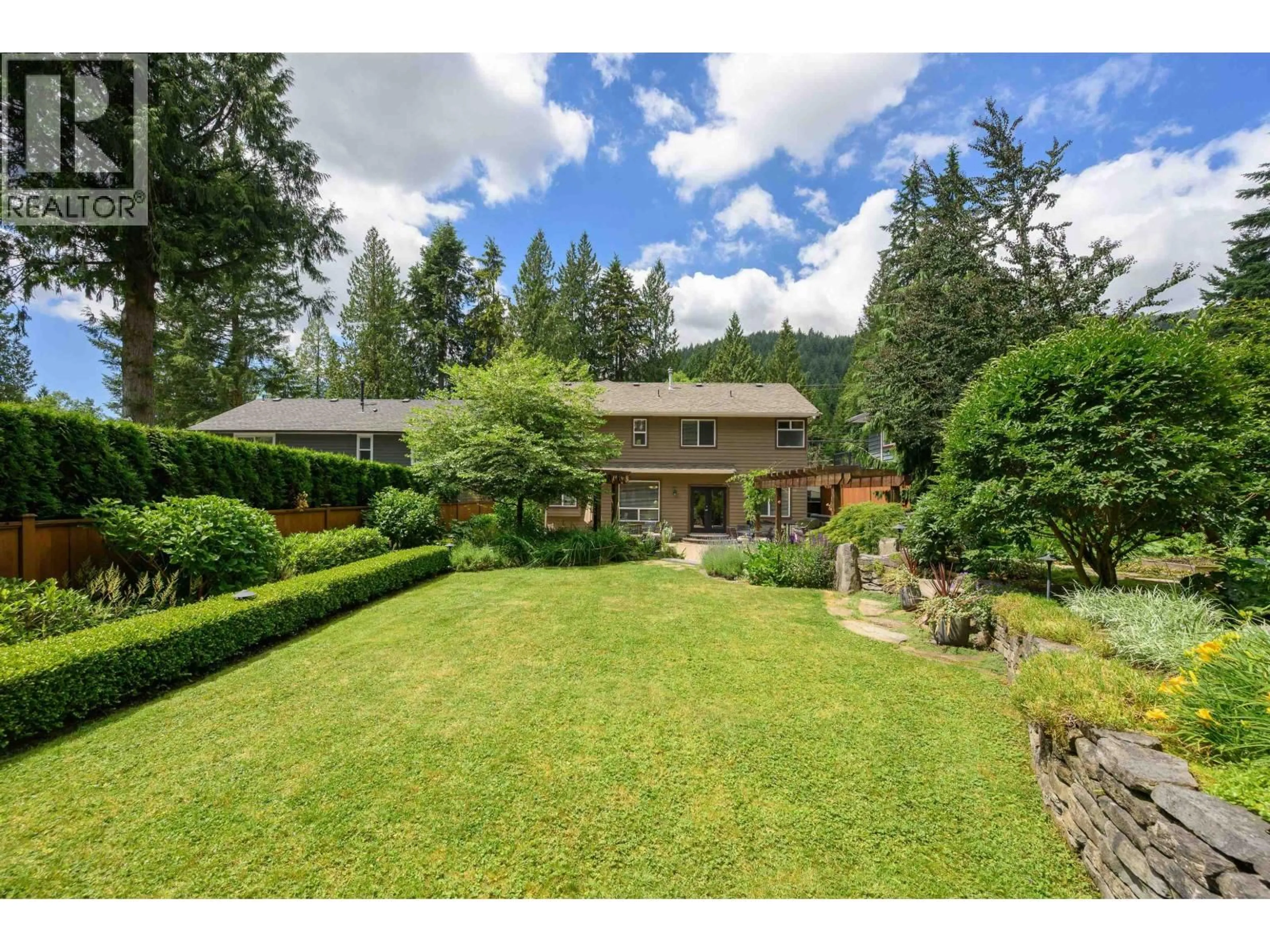 A pic from outside/outdoor area/front of a property/back of a property/a pic from drone, unknown for 4532 RAMSAY ROAD, North Vancouver British Columbia V7K2N5
