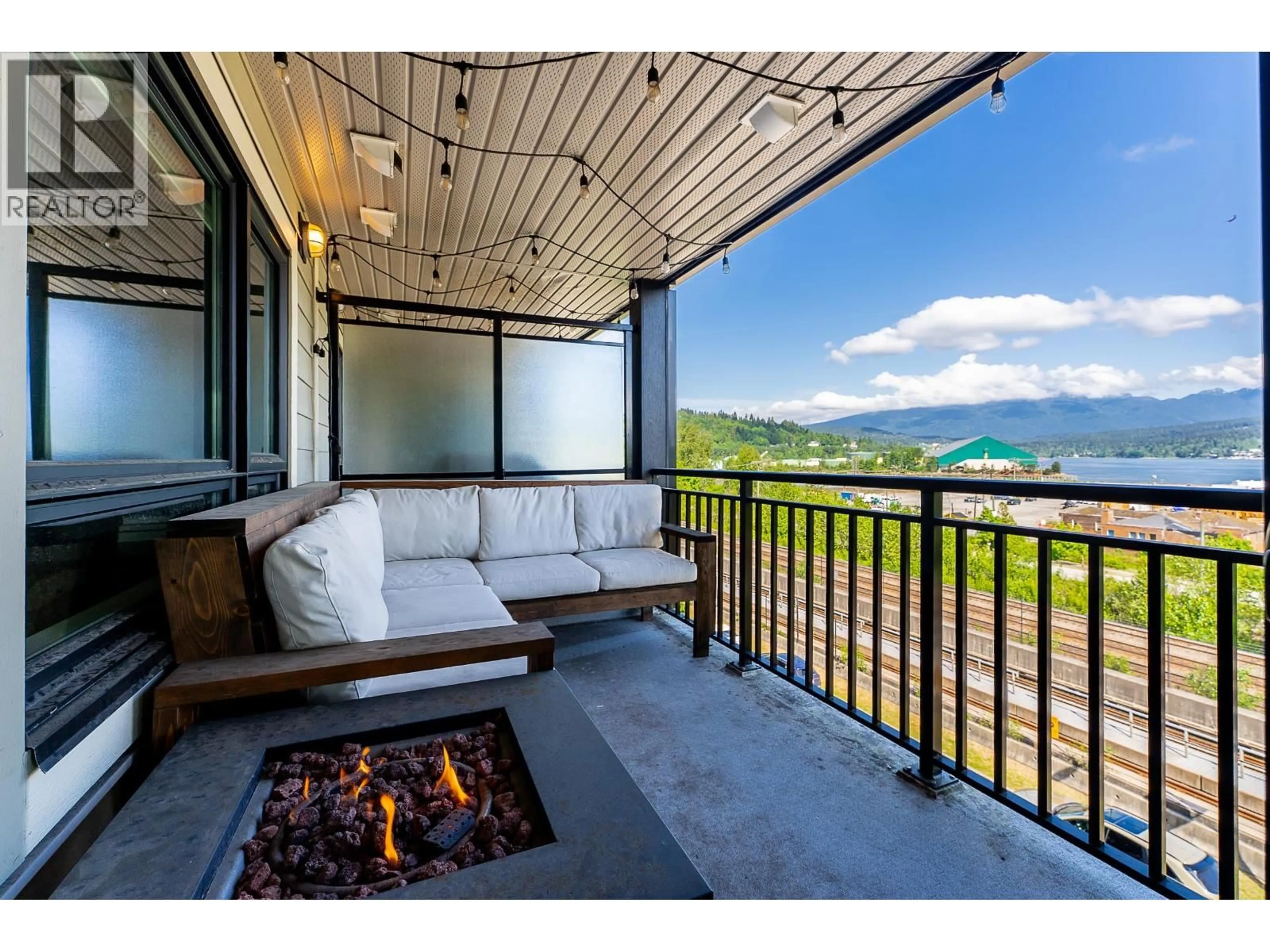 Patio, water/lake/river/ocean view for 414 - 2525 CLARKE STREET, Port Moody British Columbia V3H0J3