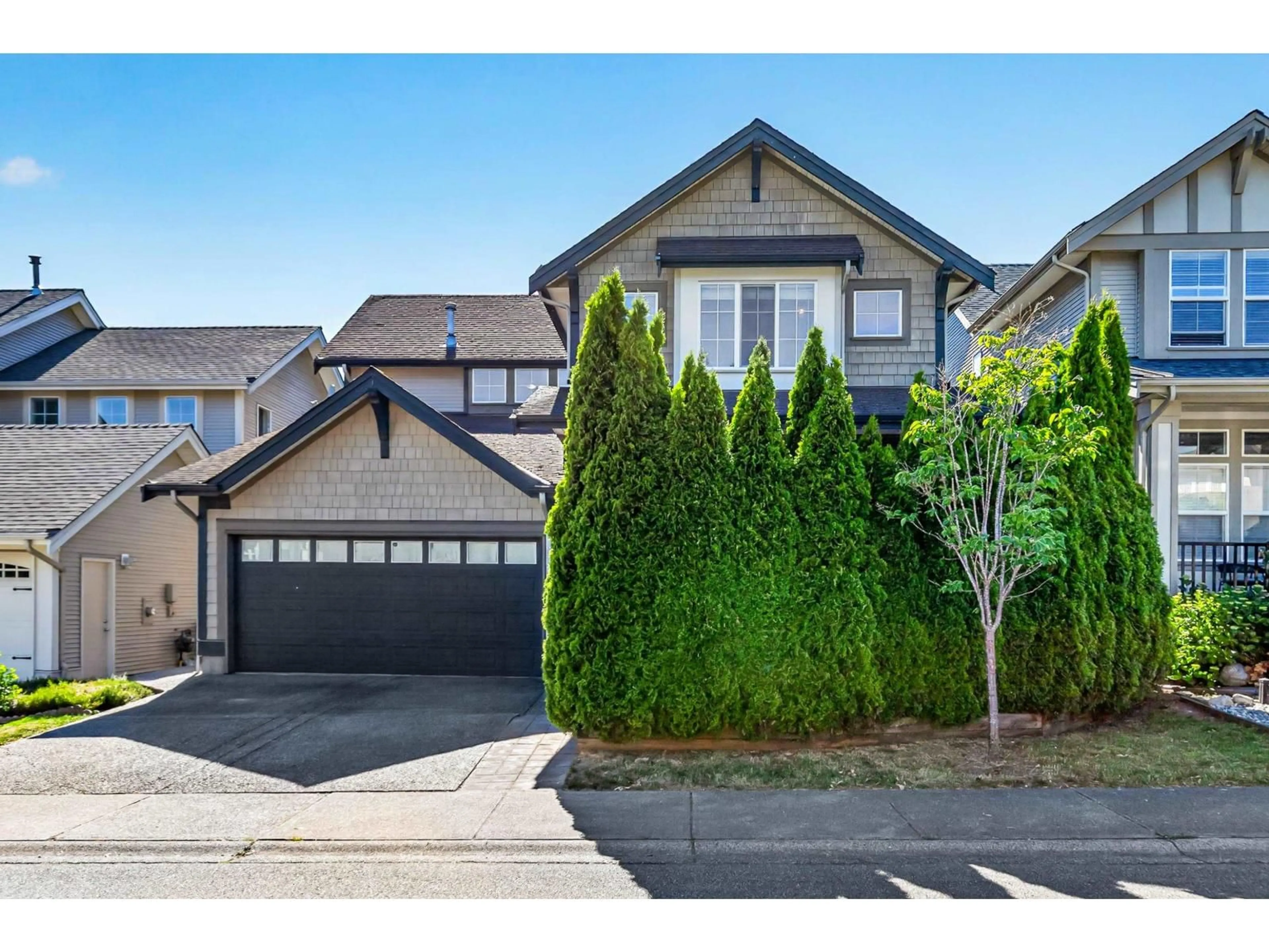 Home with vinyl exterior material, street for 7039 200B STREET, Langley British Columbia V2Y2Z3