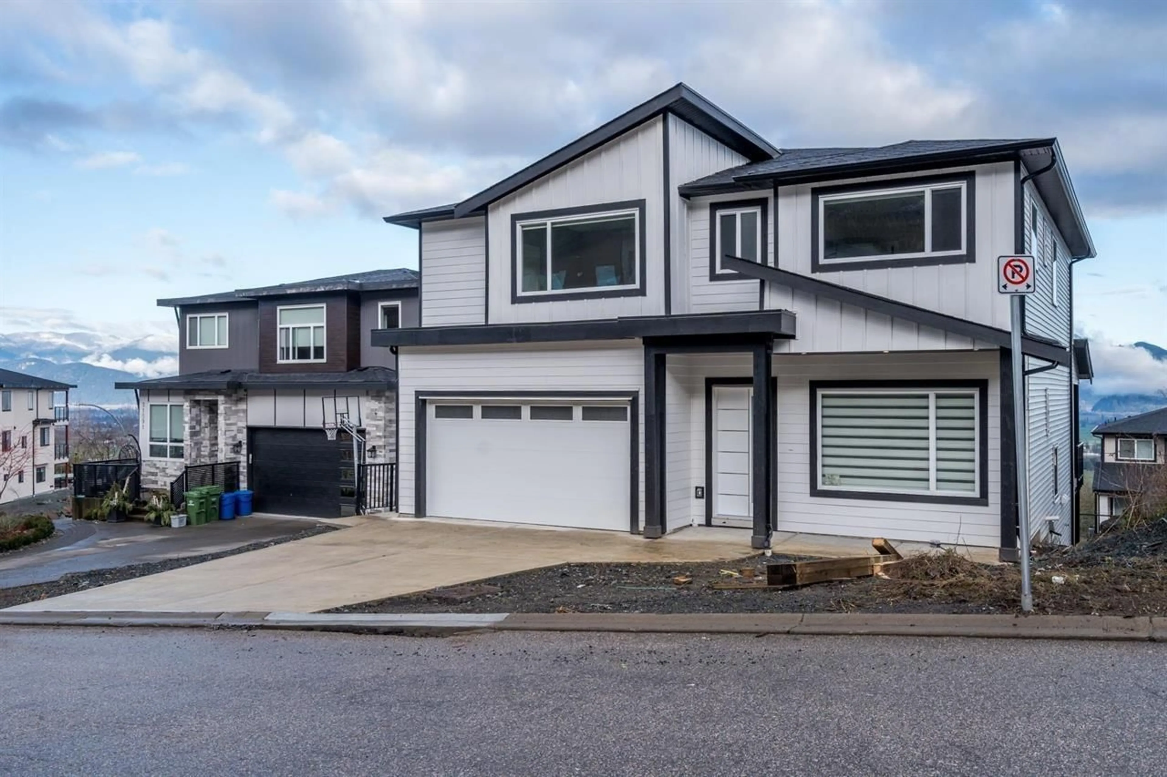 Home with vinyl exterior material, street for Surrey - 51097 FARMERS WAY WAY, Chilliwack British Columbia V4Z0E4