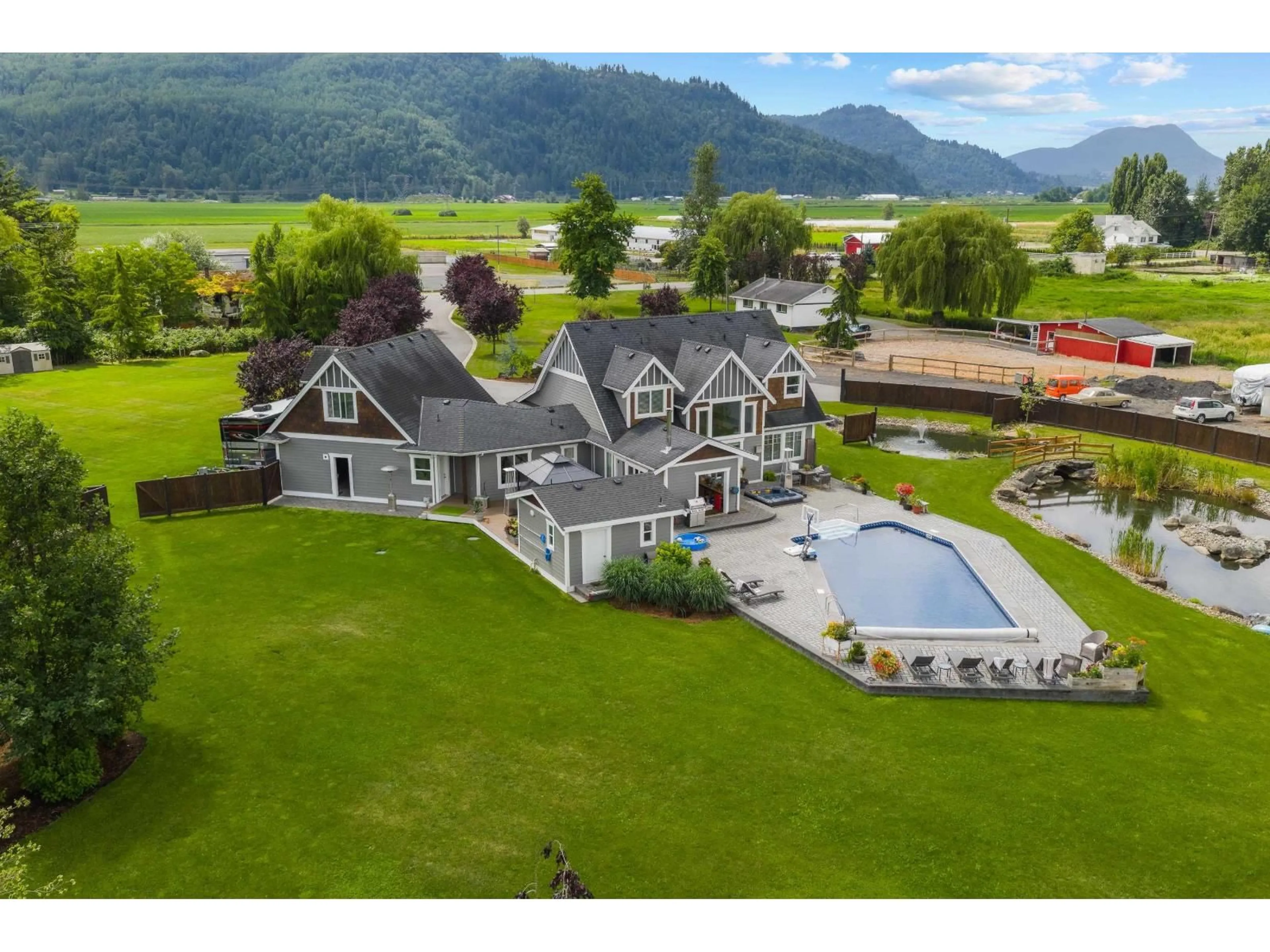A pic from outside/outdoor area/front of a property/back of a property/a pic from drone, water/lake/river/ocean view for 49517 PRAIRIE CENTRAL ROAD, Chilliwack British Columbia V2P6H3