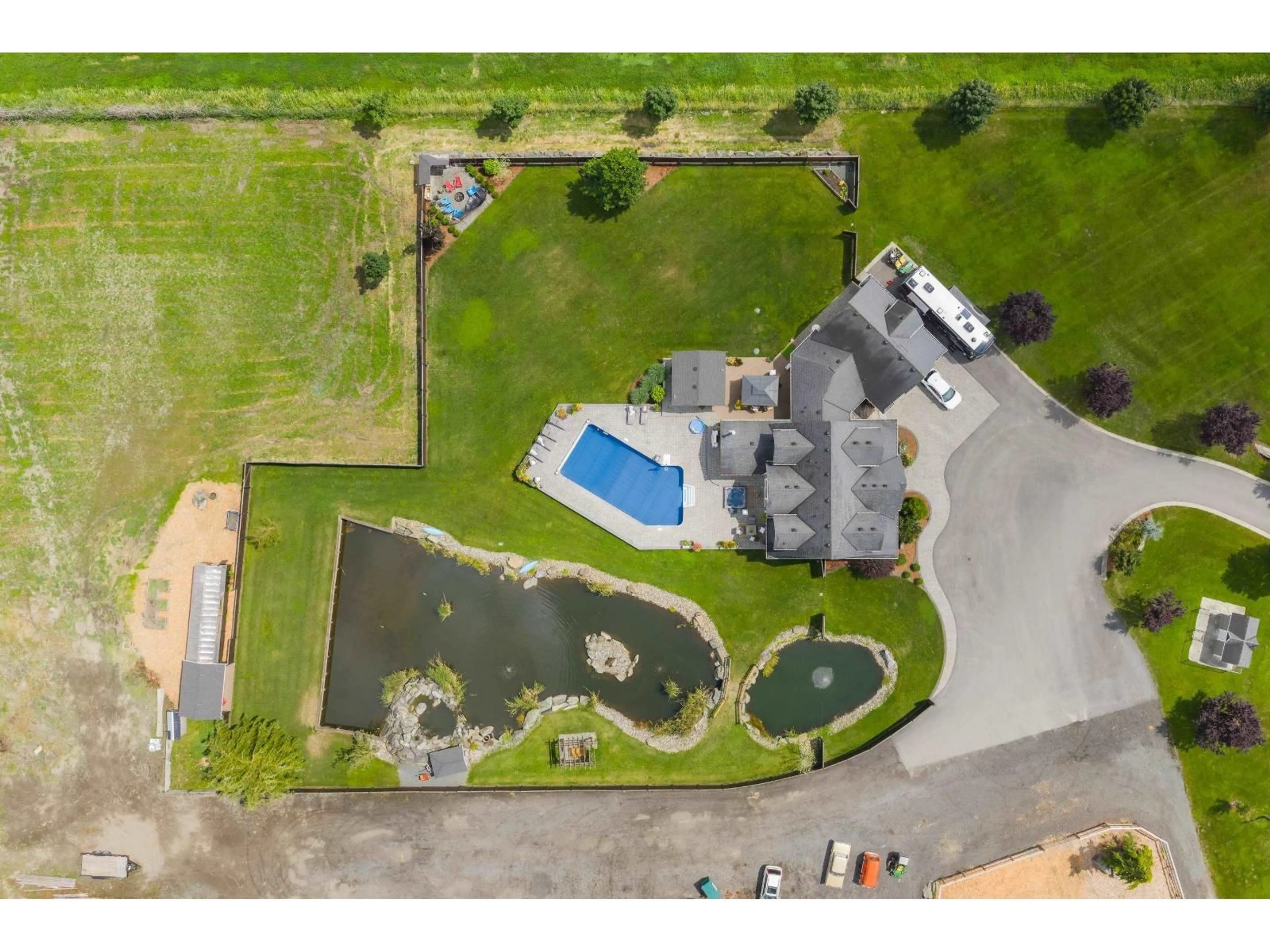 A pic from outside/outdoor area/front of a property/back of a property/a pic from drone, water/lake/river/ocean view for 49517 PRAIRIE CENTRAL ROAD, Chilliwack British Columbia V2P6H3