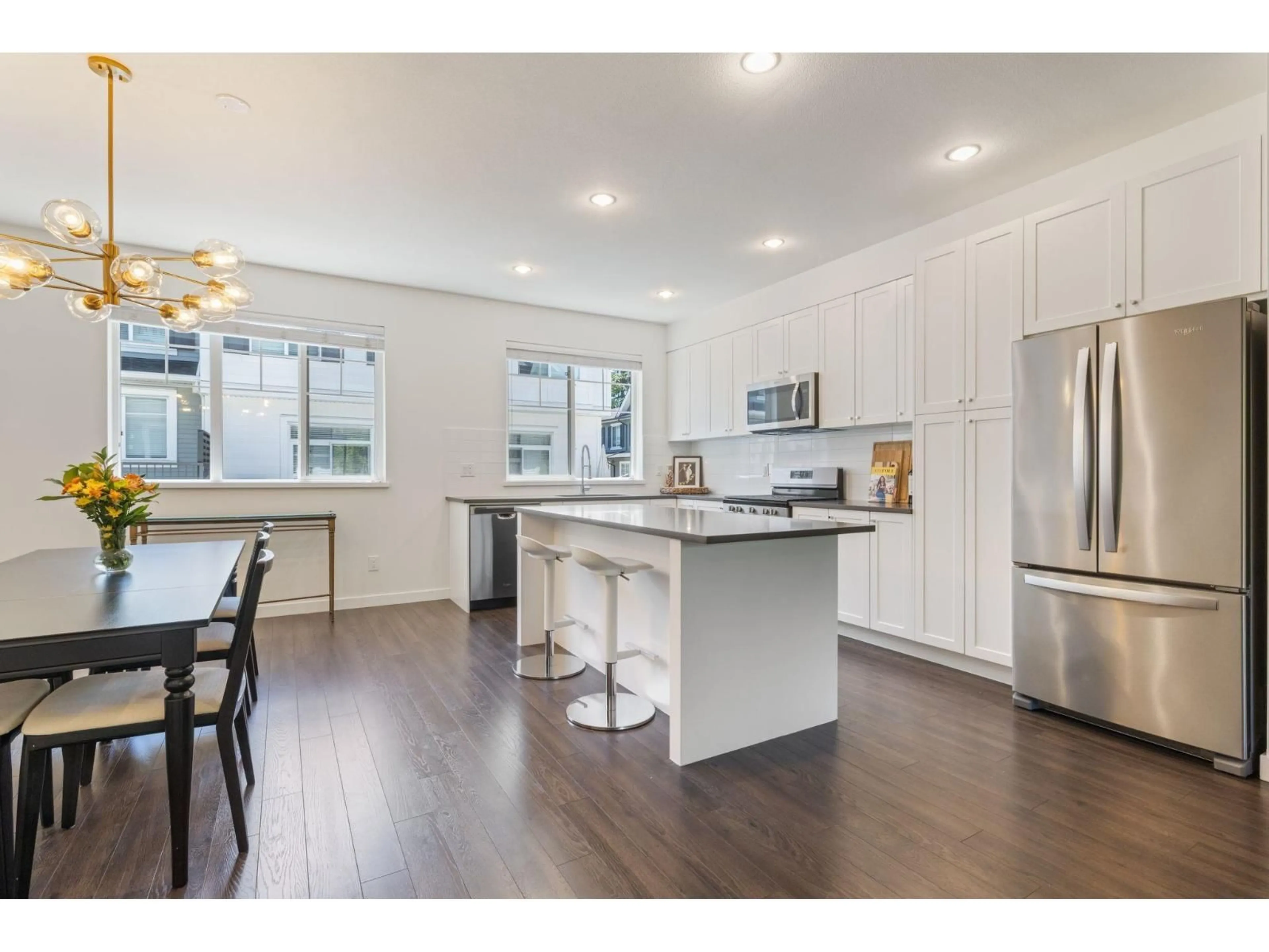 Open concept kitchen, wood/laminate floor for 31 - 16357 15 AVENUE, Surrey British Columbia V4A0C2