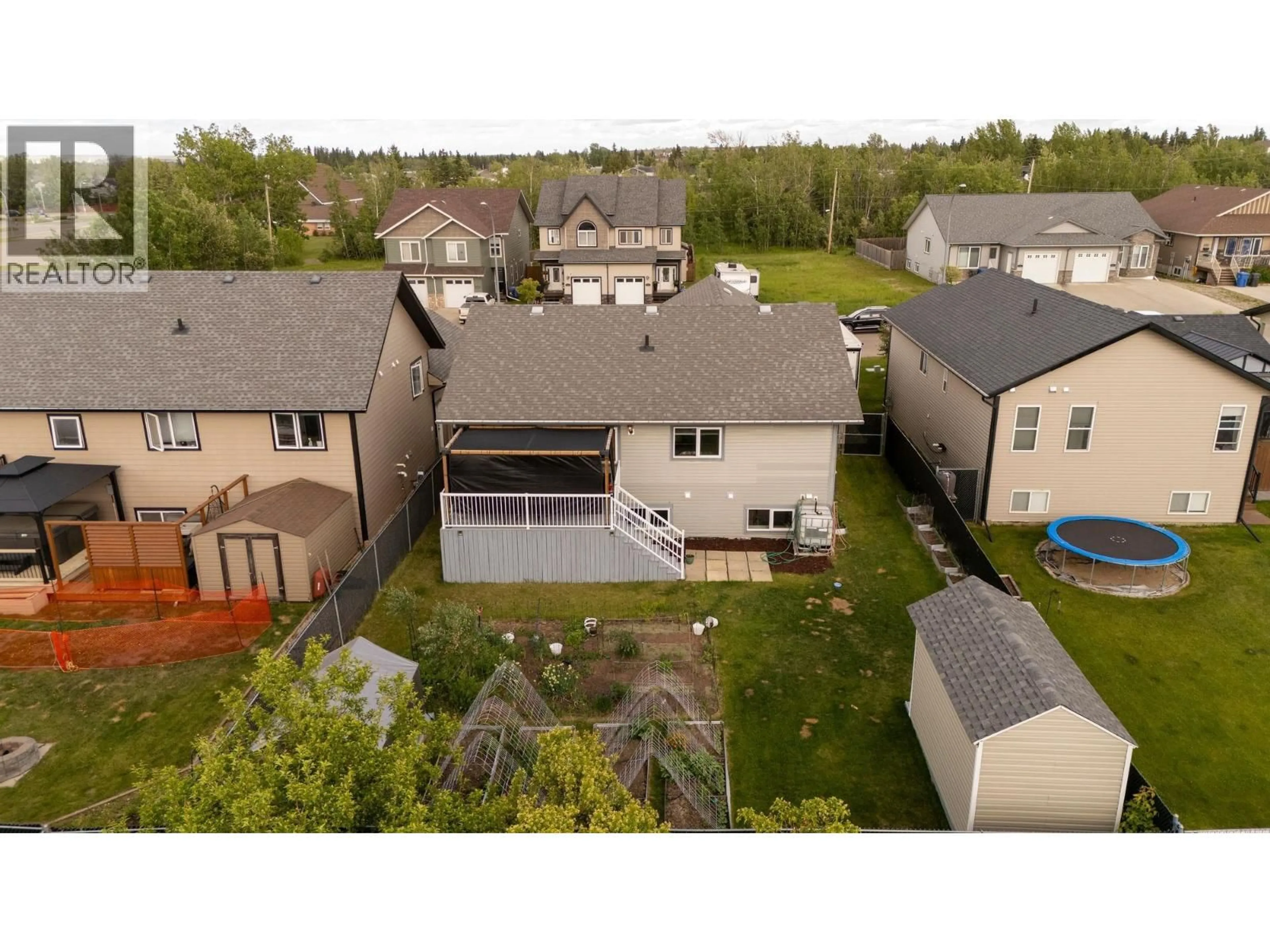 A pic from outside/outdoor area/front of a property/back of a property/a pic from drone, street for 11320 102 STREET, Fort St. John British Columbia V1J4W9