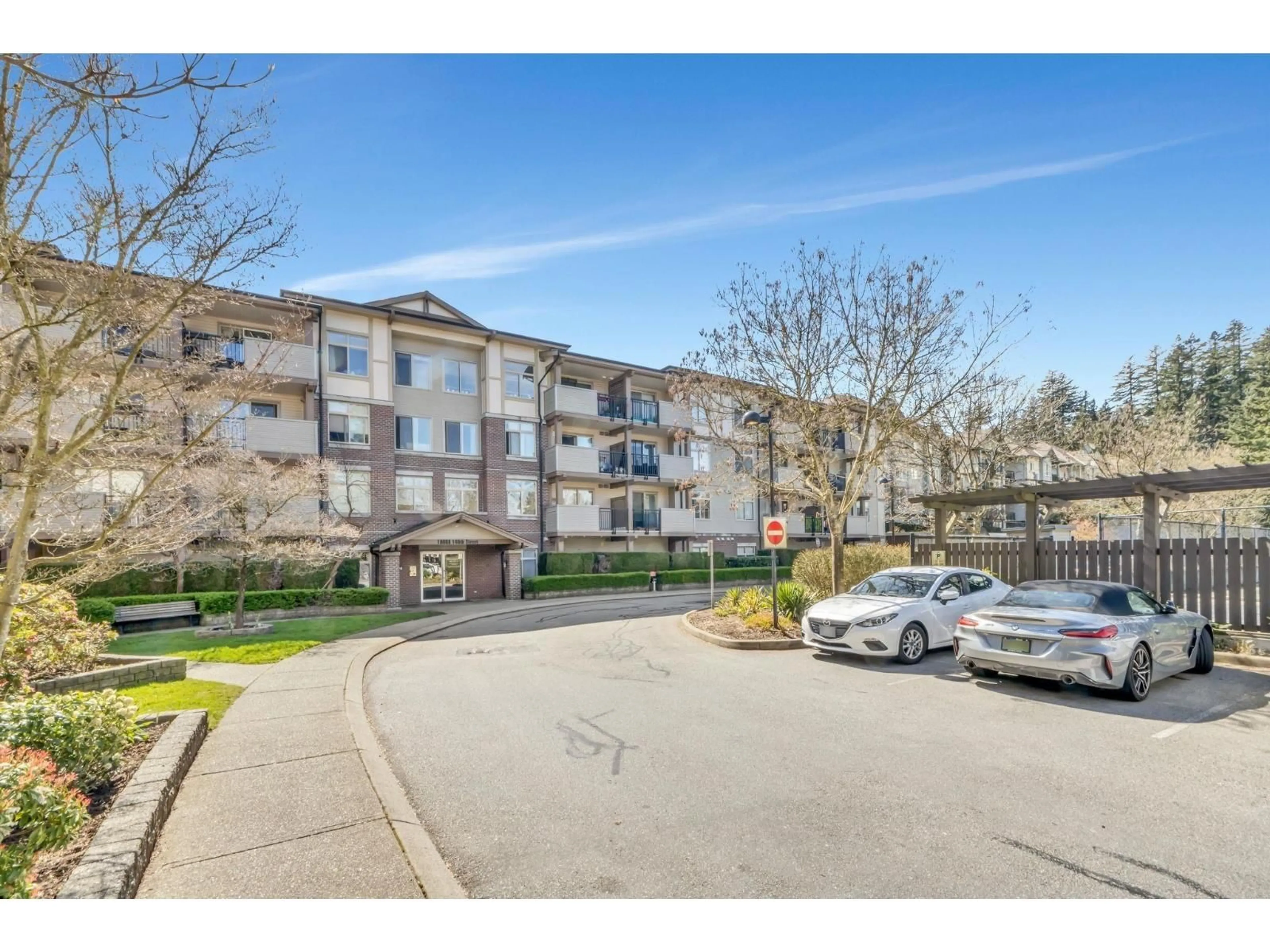 A pic from outside/outdoor area/front of a property/back of a property/a pic from drone, street for 108 - 10088 148 STREET, Surrey British Columbia V3R3M9