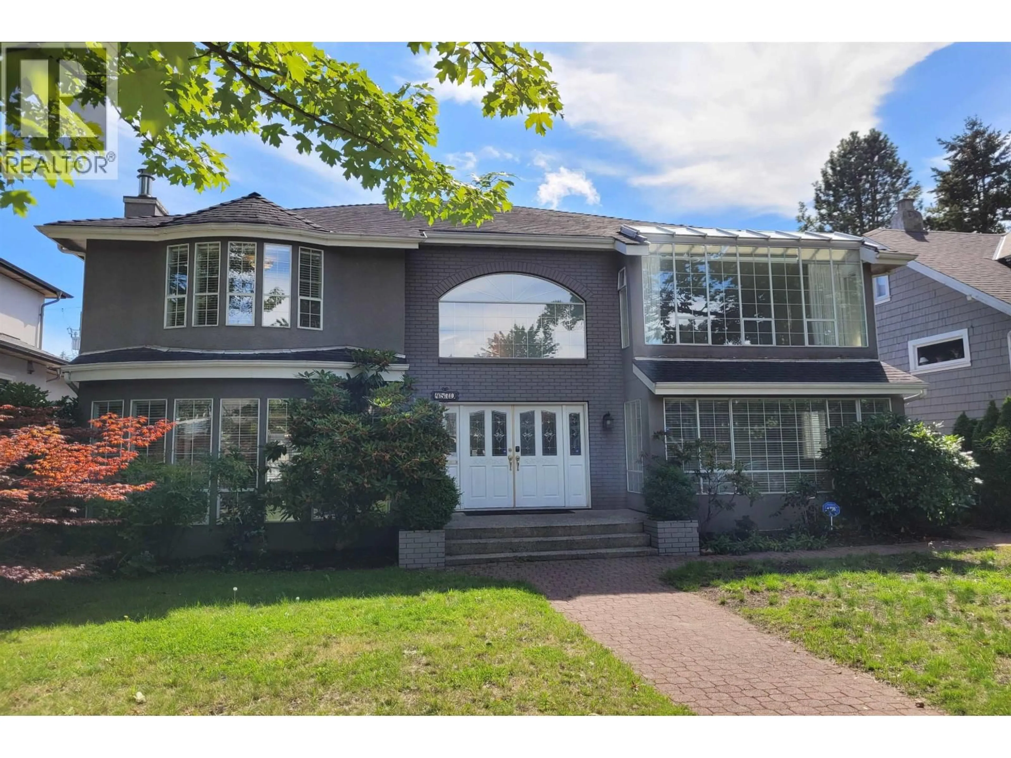 Home with vinyl exterior material, street for 4570 13TH AVENUE, Vancouver British Columbia V6R2V4