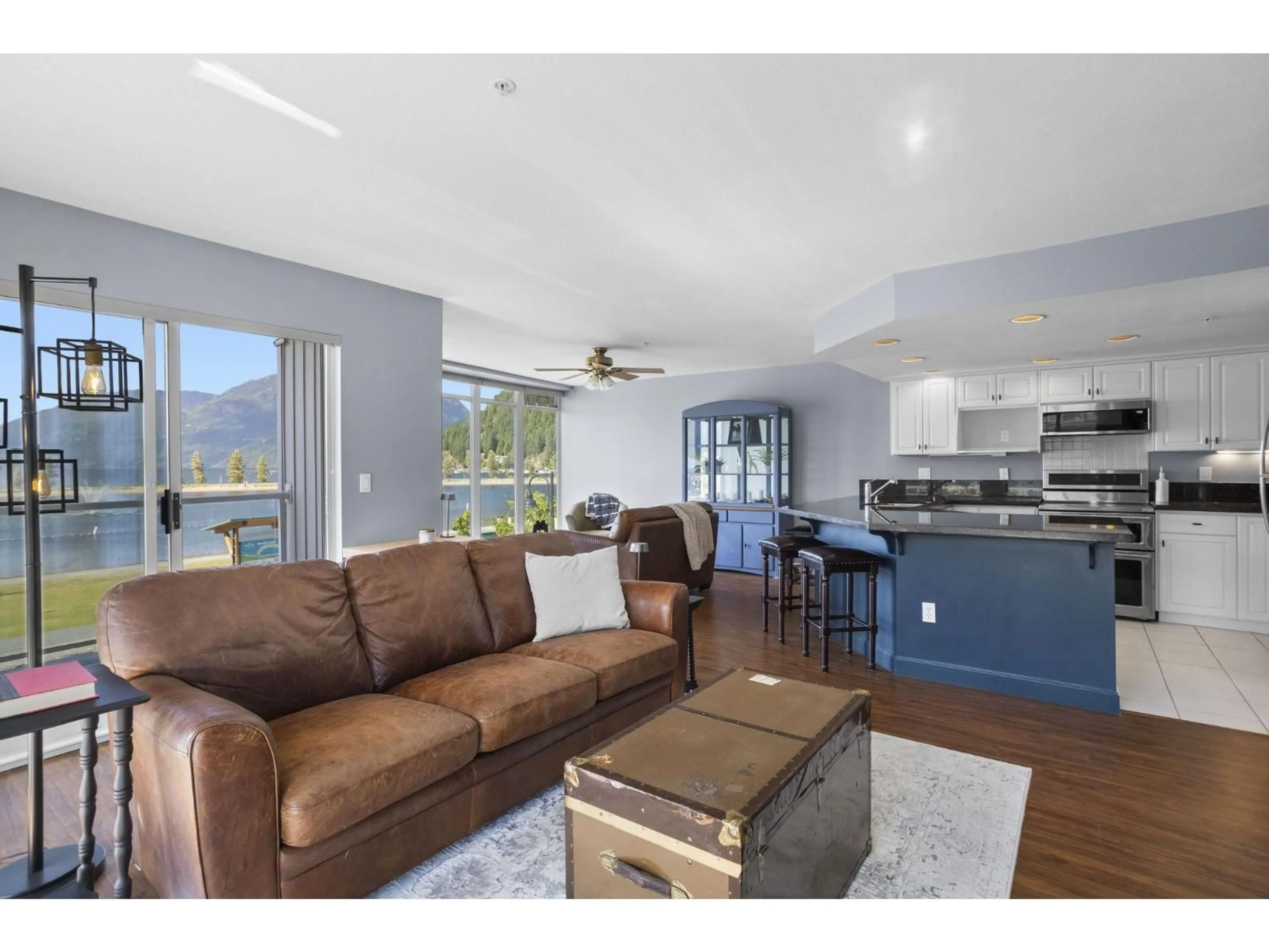 Living room with furniture, wood/laminate floor for 215 - 328 ESPLANADE AVENUE, Harrison Hot Springs British Columbia V0M1K0