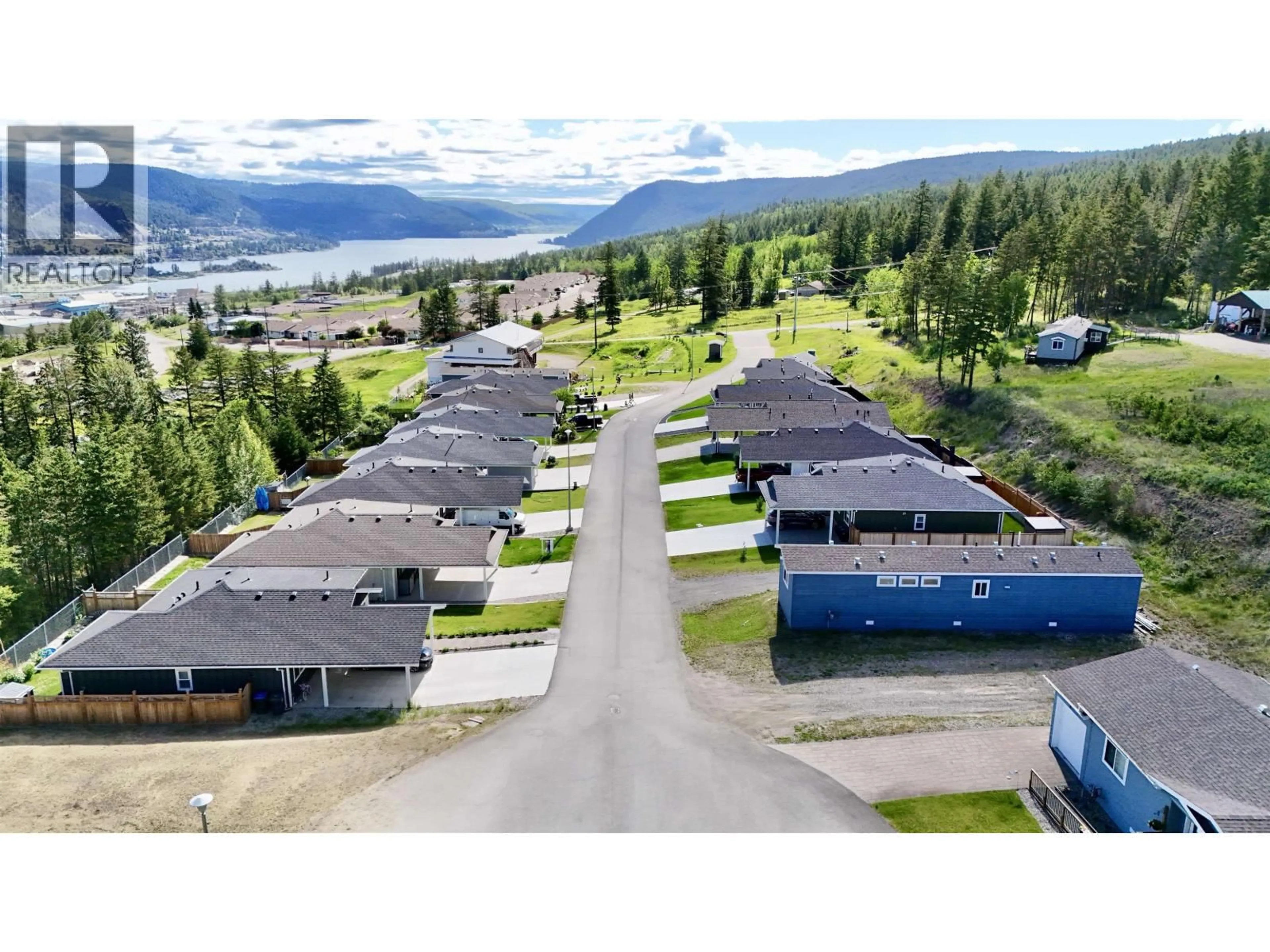 A pic from outside/outdoor area/front of a property/back of a property/a pic from drone, mountain view for 16 - 555 WOTZKE DRIVE, Williams Lake British Columbia V2G4K2