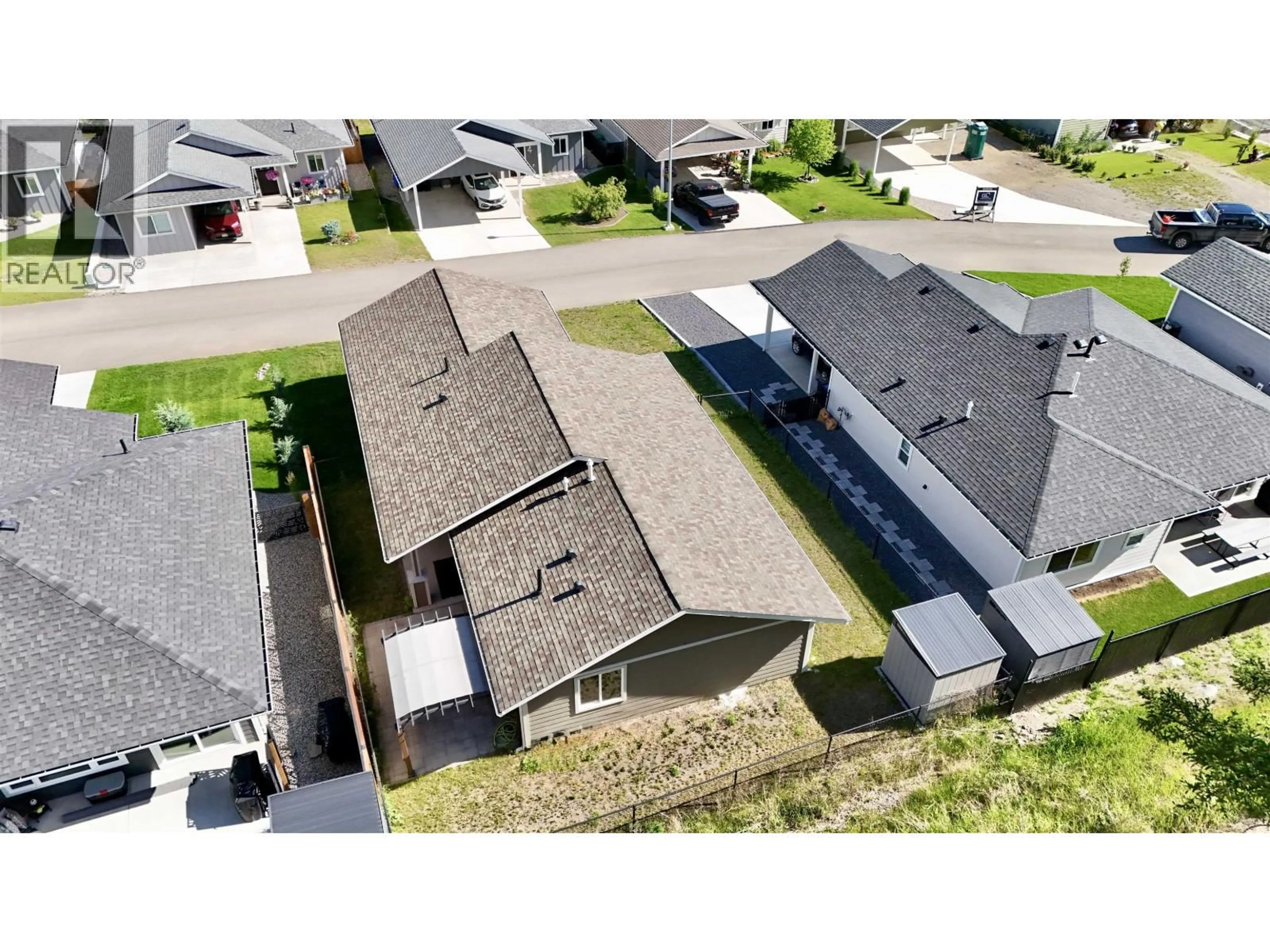 A pic from outside/outdoor area/front of a property/back of a property/a pic from drone, street for 16 - 555 WOTZKE DRIVE, Williams Lake British Columbia V2G4K2