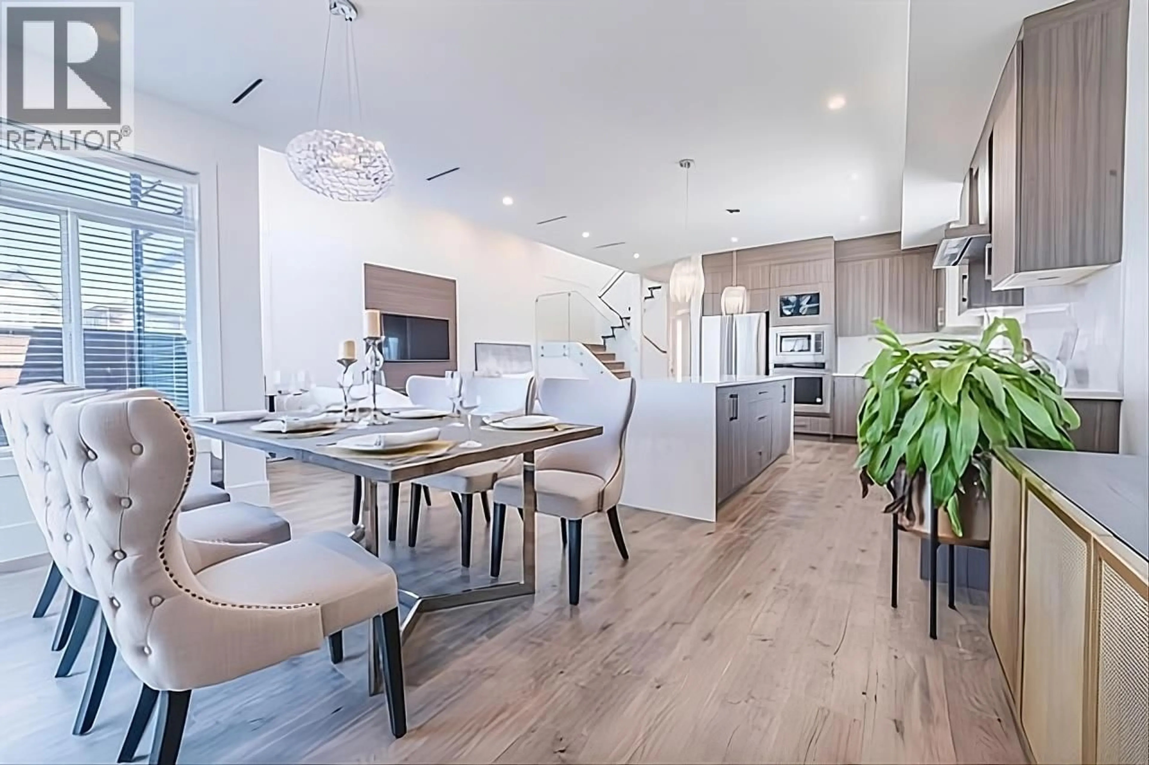 Open concept kitchen, wood/laminate floor for 12208 BUCHANAN STREET, Richmond British Columbia V7E0C2