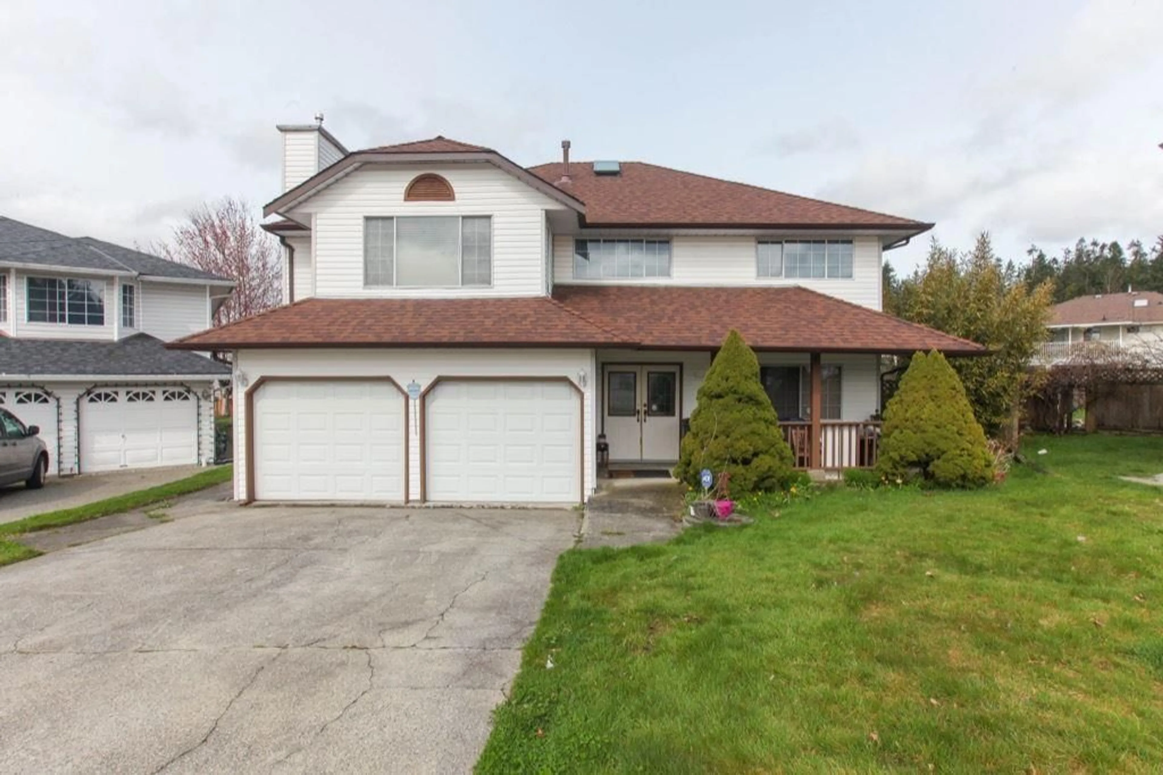 Home with vinyl exterior material, street for 14305 91 AVENUE, Surrey British Columbia V3V7T7