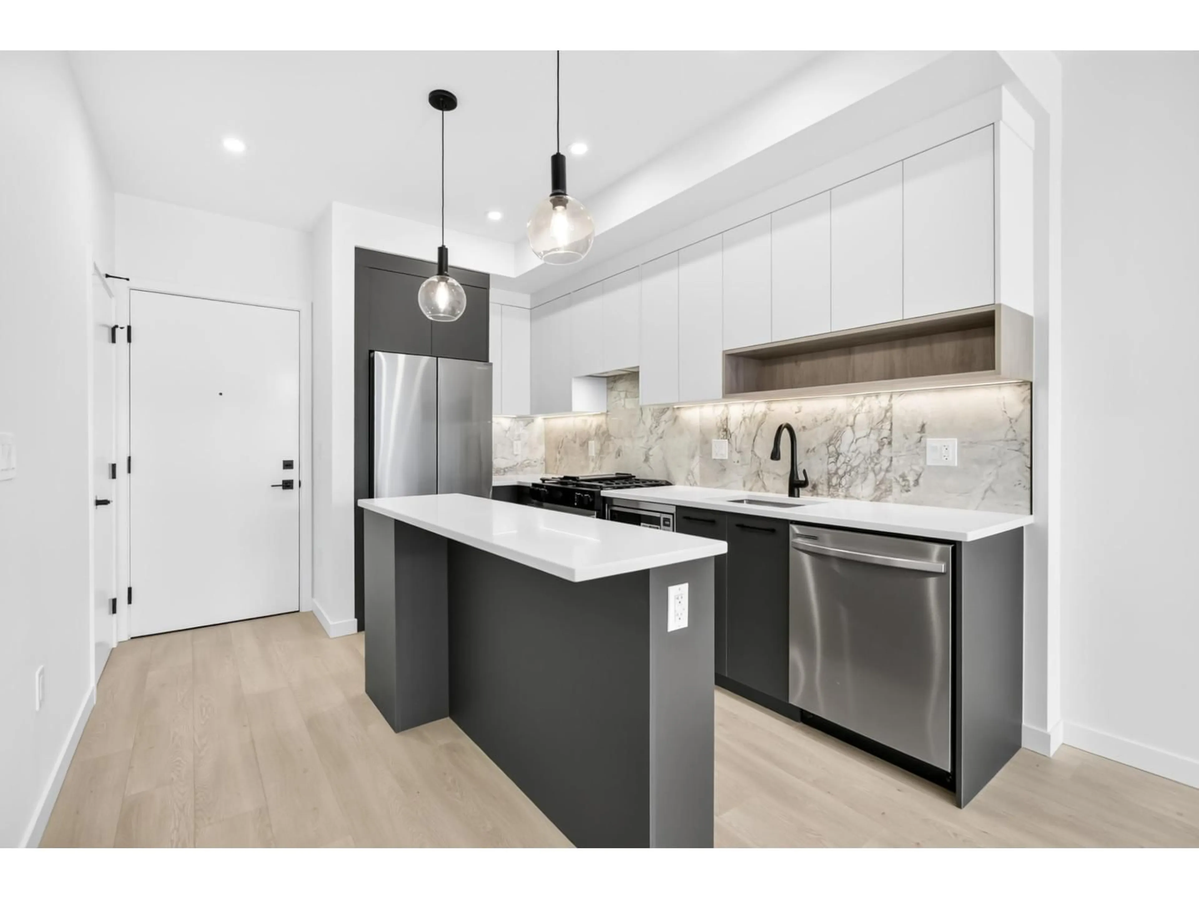 Open concept kitchen, unknown for 220 - 6220 GOOSEBERRY DRIVE, Surrey British Columbia V3S0C7