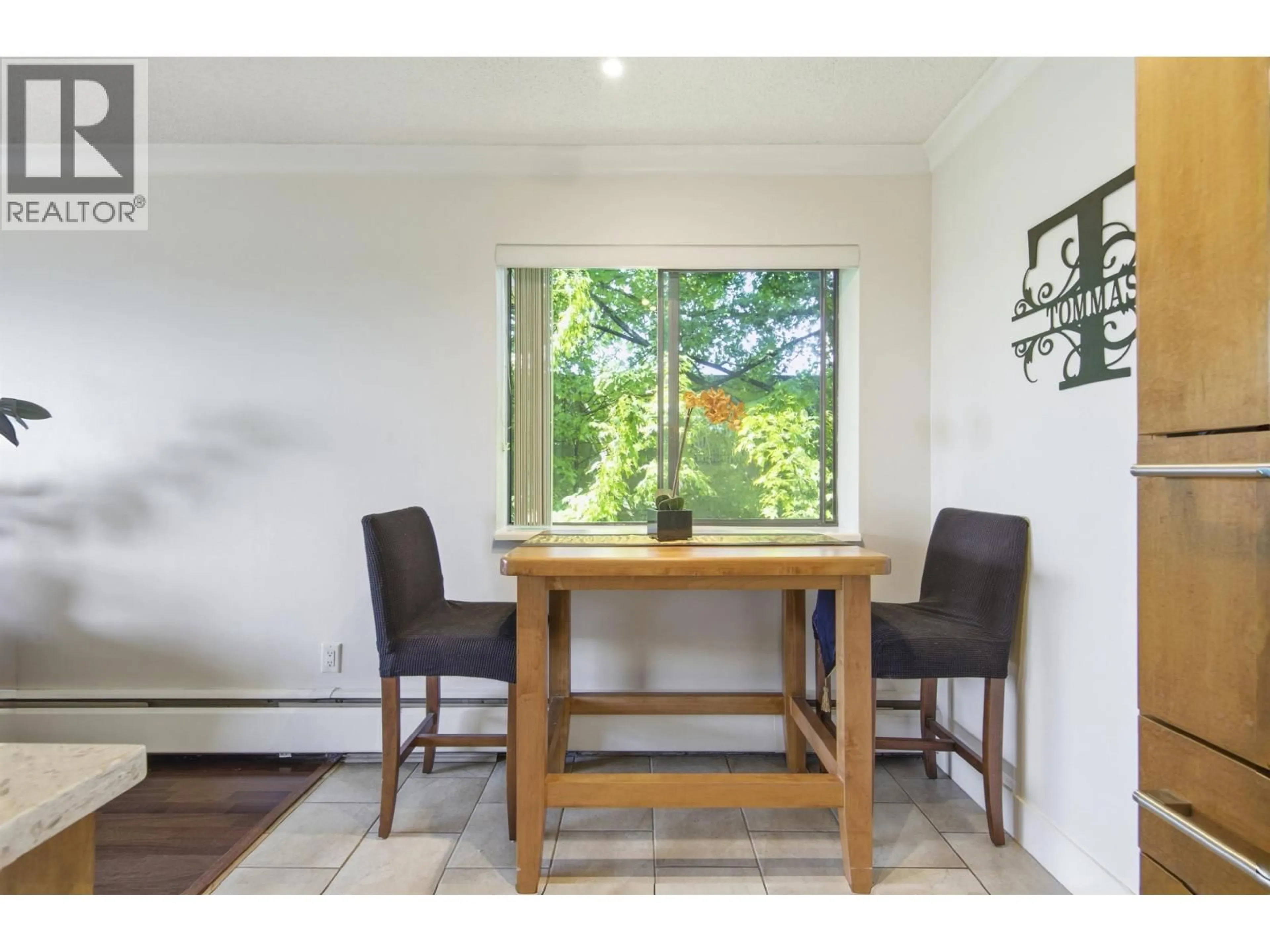 Dining room, wood/laminate floor for 222 - 340 3RD STREET, North Vancouver British Columbia V7M1G4