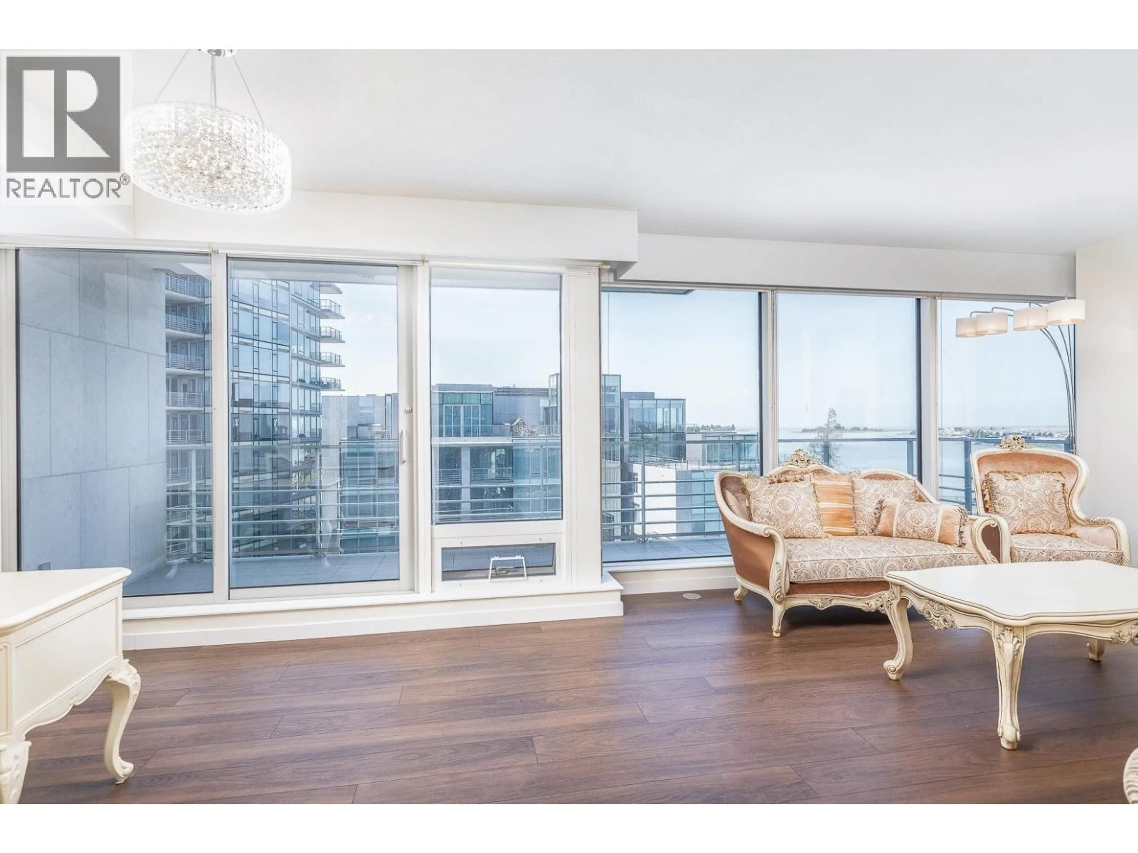 Living room with furniture, wood/laminate floor for 804 - 5131 BRIGHOUSE WAY, Richmond British Columbia V7C0A6