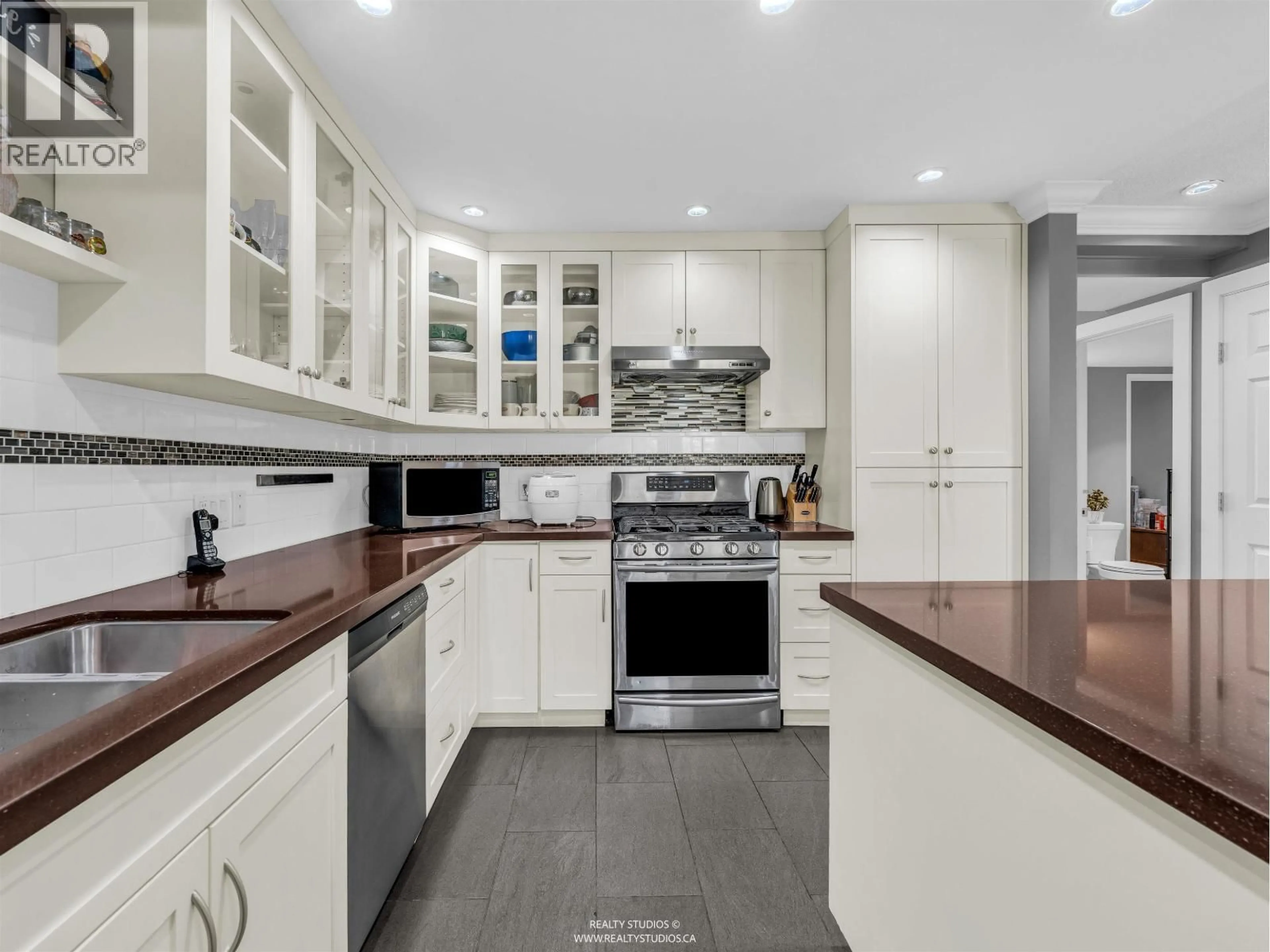 Contemporary kitchen, ceramic/tile floor for 7170 HECATE PLACE, Vancouver British Columbia V5S4C4