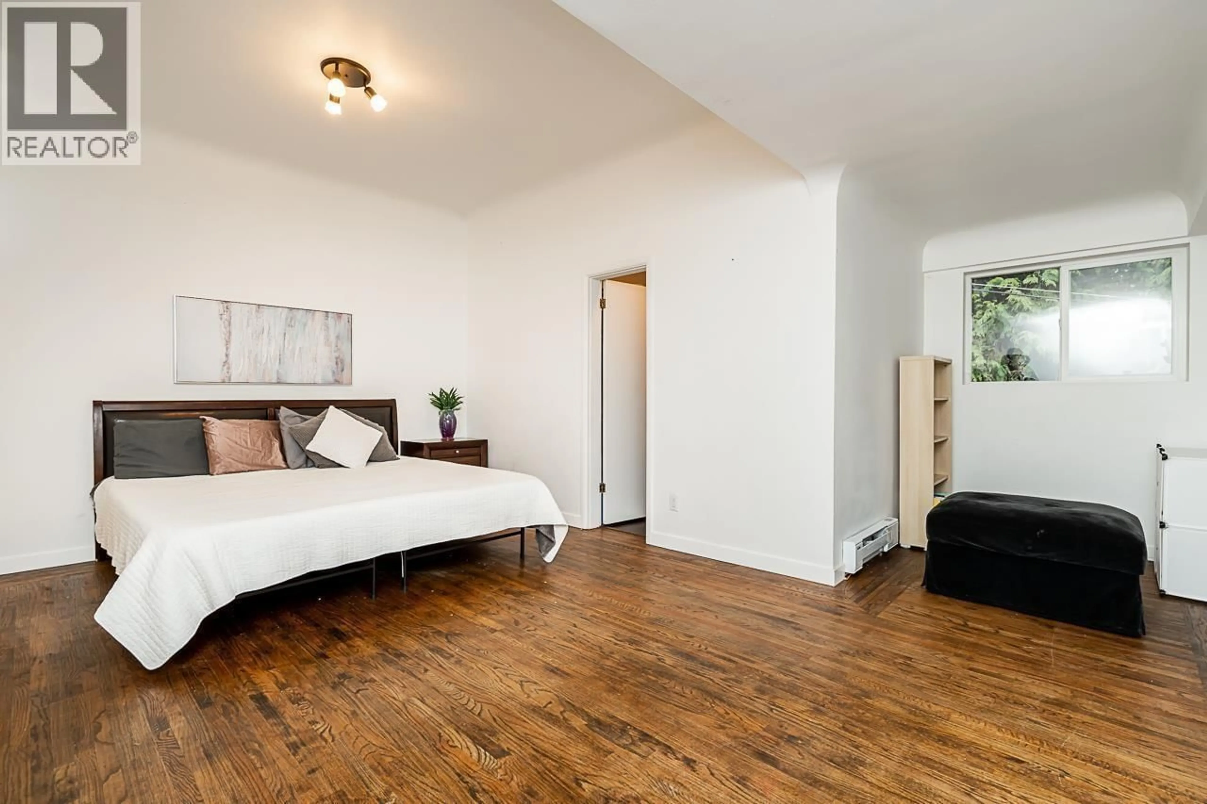 Bedroom with bed, wood/laminate floor for 25745 LOUGHEED HIGHWAY, Maple Ridge British Columbia V2W1M3